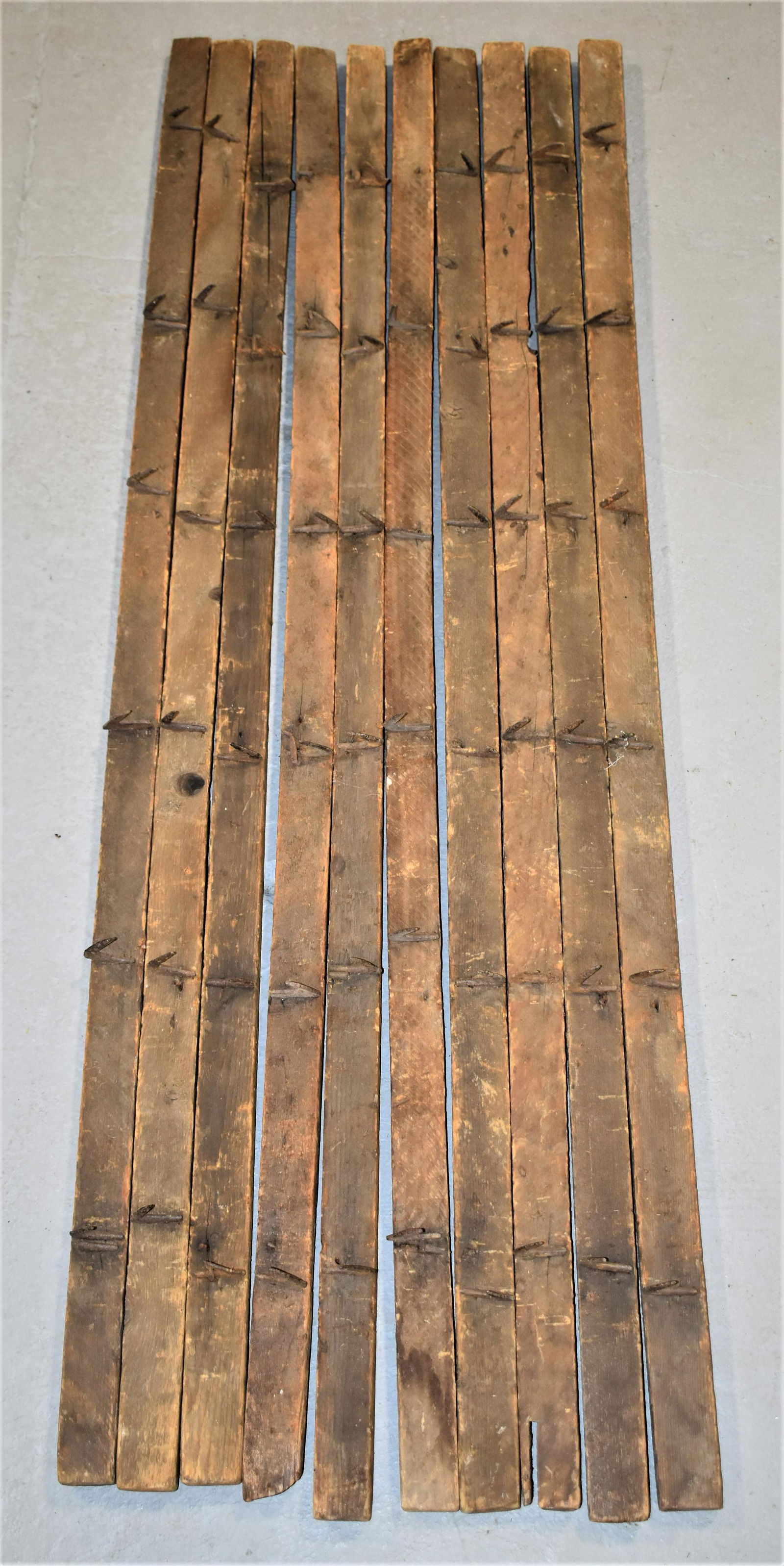 10 Wooden Drying Racks with Iron Hooks: LOT (10) PRIMATIVE WOODEN WALL HANGING DRYING RACKS WITH WROUGHT IRON HOOKS- EACH WITH 6 HOOKS- 48" L