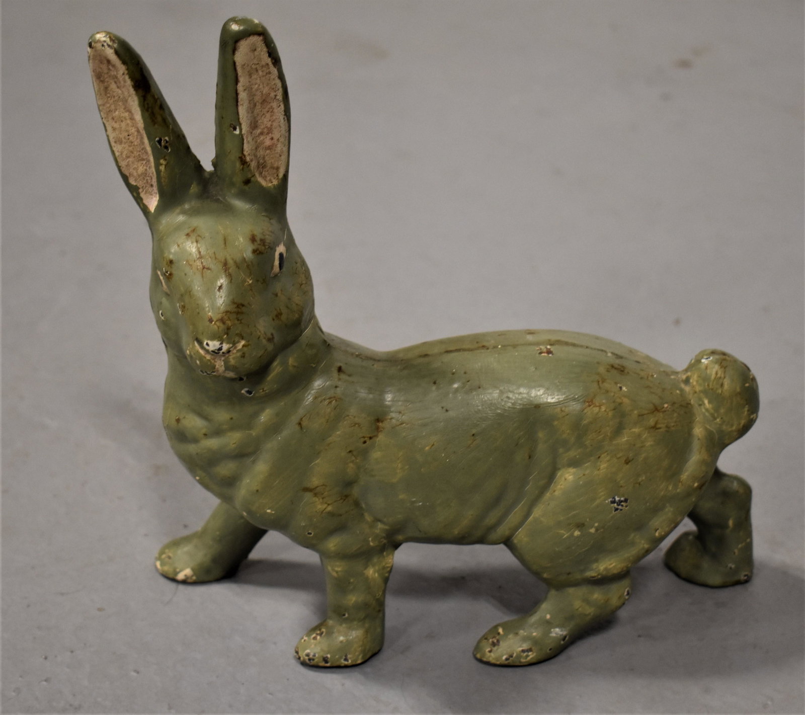 Vintage Painted Cast Iron Rabbit Doorstop: 8 1/2" STANDING RABBIT (FACING LEFT) PAINTED CAST IRON DOORSTOP- 8 1/2" L X 8 3/4" T- WEAR, LOSSES TO PAINT AND IMPERFECTIONS
