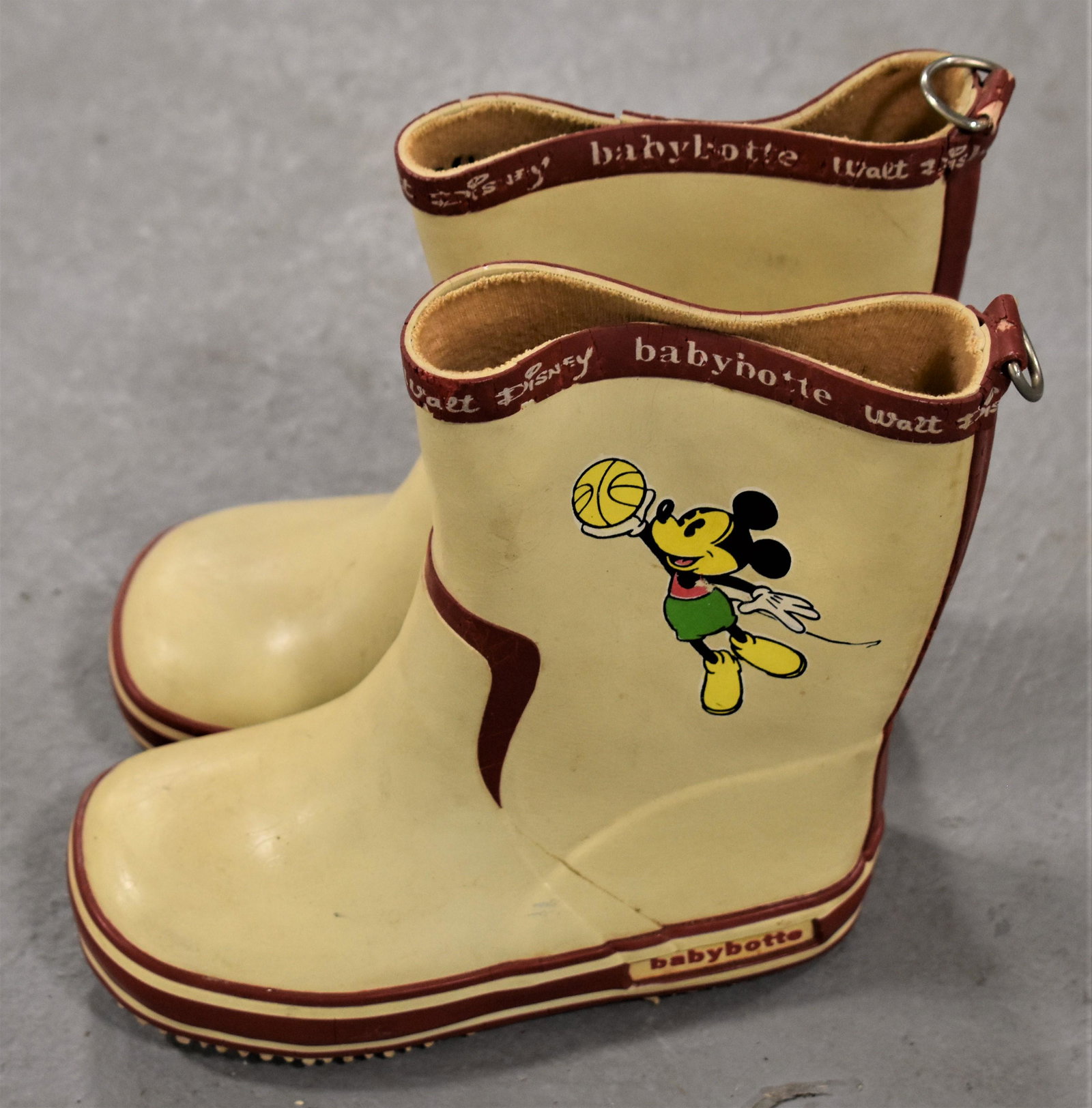 Vintage Mickey Mouse Rubber Babybotte: PAIR VINTAGE RUBBER BOOTS- WALT DISNEY BABYBOTTE WITH MICKEY MOUSE DECALS- SIZE 22, 6" T X 6" L- WEAR AND IMPERFECTIONS, RUBBER IS HARD WITH NO FLEXIBILITY