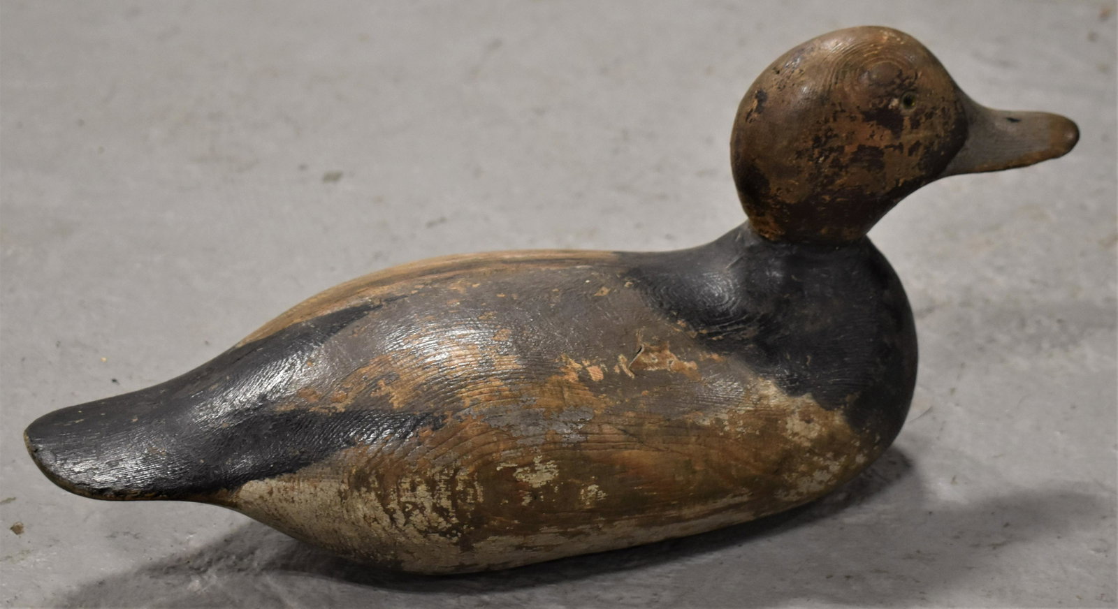 Carved and Painted Broadbill Decoy: VINTAGE MASON HEN CARVED AND PAINTED BROADBILL DECOY - 14 1/2" LONG - WEAR AND LOSSES TO PAINT - SPLIT IN TOP - IMPERFECTIONS
