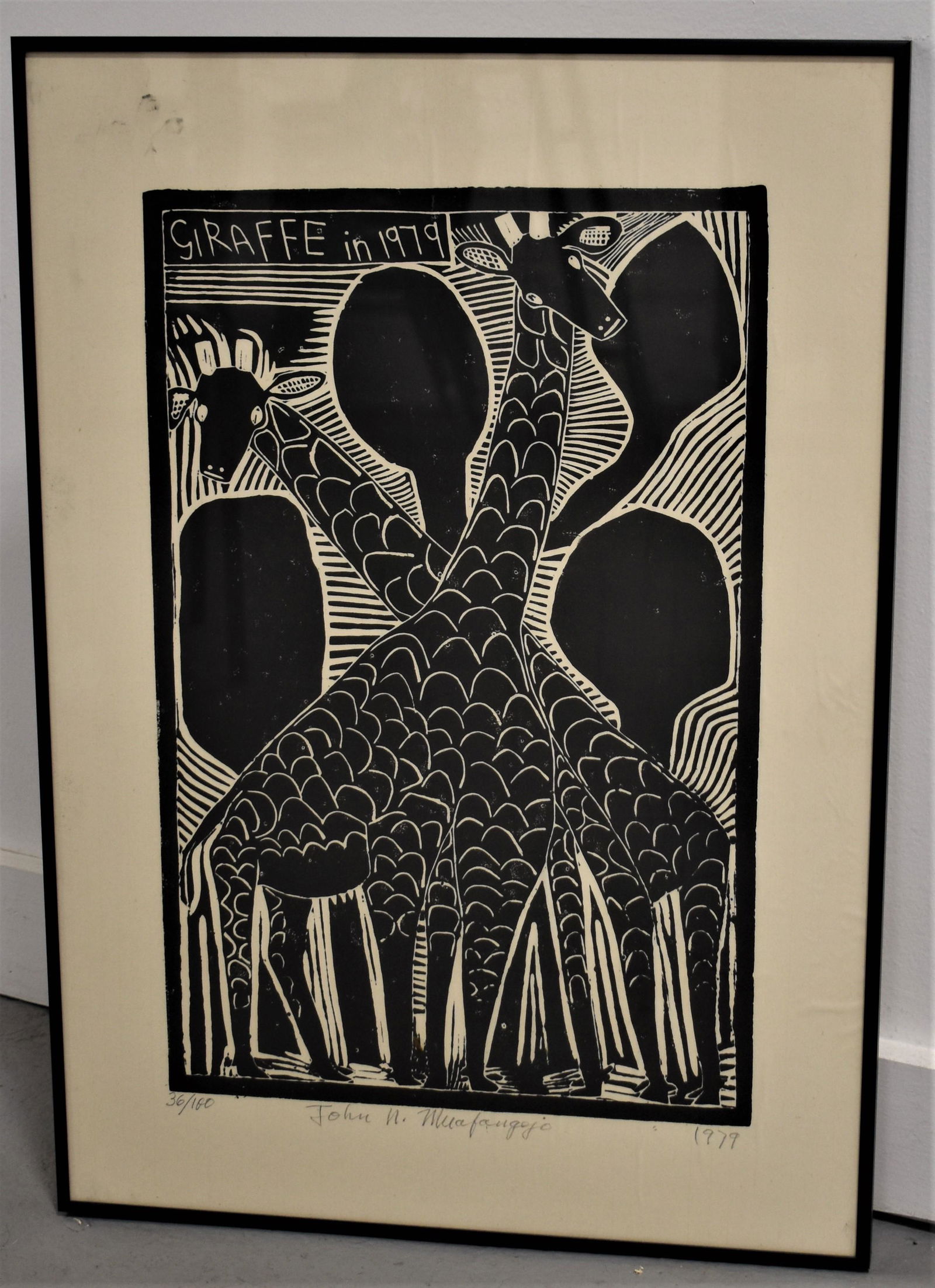 John Muafangejo Lino Cut Giraffee Print 1979: 1979 LINOLEUM CUT PRINT TITLED GIRAFFE IN 1979 LIMITED EDITION 36/100 SIGNED JOHN N. MUAFANGEJO 1979 IN PENCIL ACROSS BOTTOM - 23" X 16" - WRINKLES, SMALL STAINS, IMPERFECTIONS