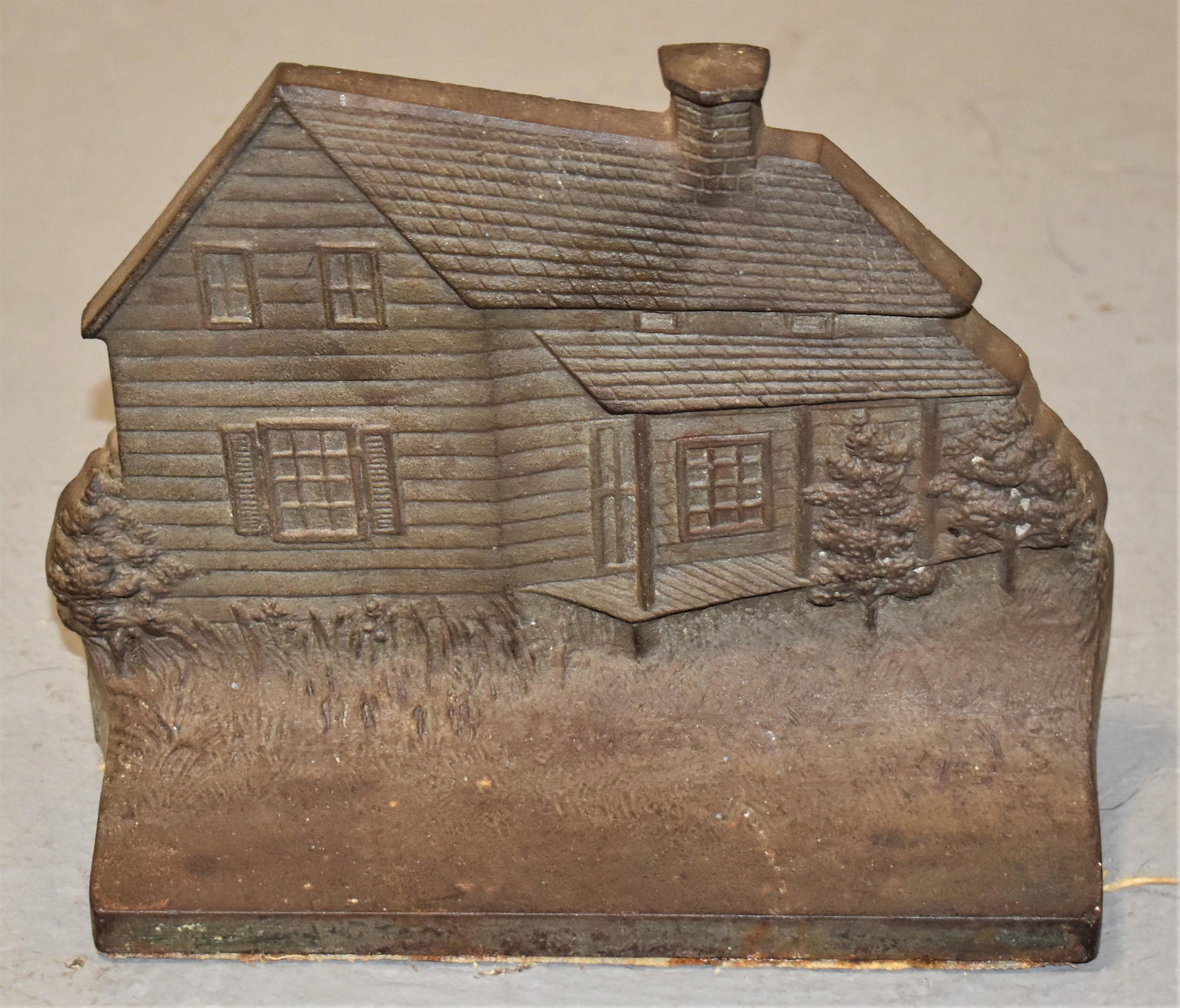 Bradley and Hubbard Cast Iron Cottage Doorstop: UNPAINTED CAST IRON DOORSTOP - EDGAR ALLEN POE CABIN - MARKED B AND H ON BACK - 6"T X 7 1/2"L - IMPERFECTIONS
