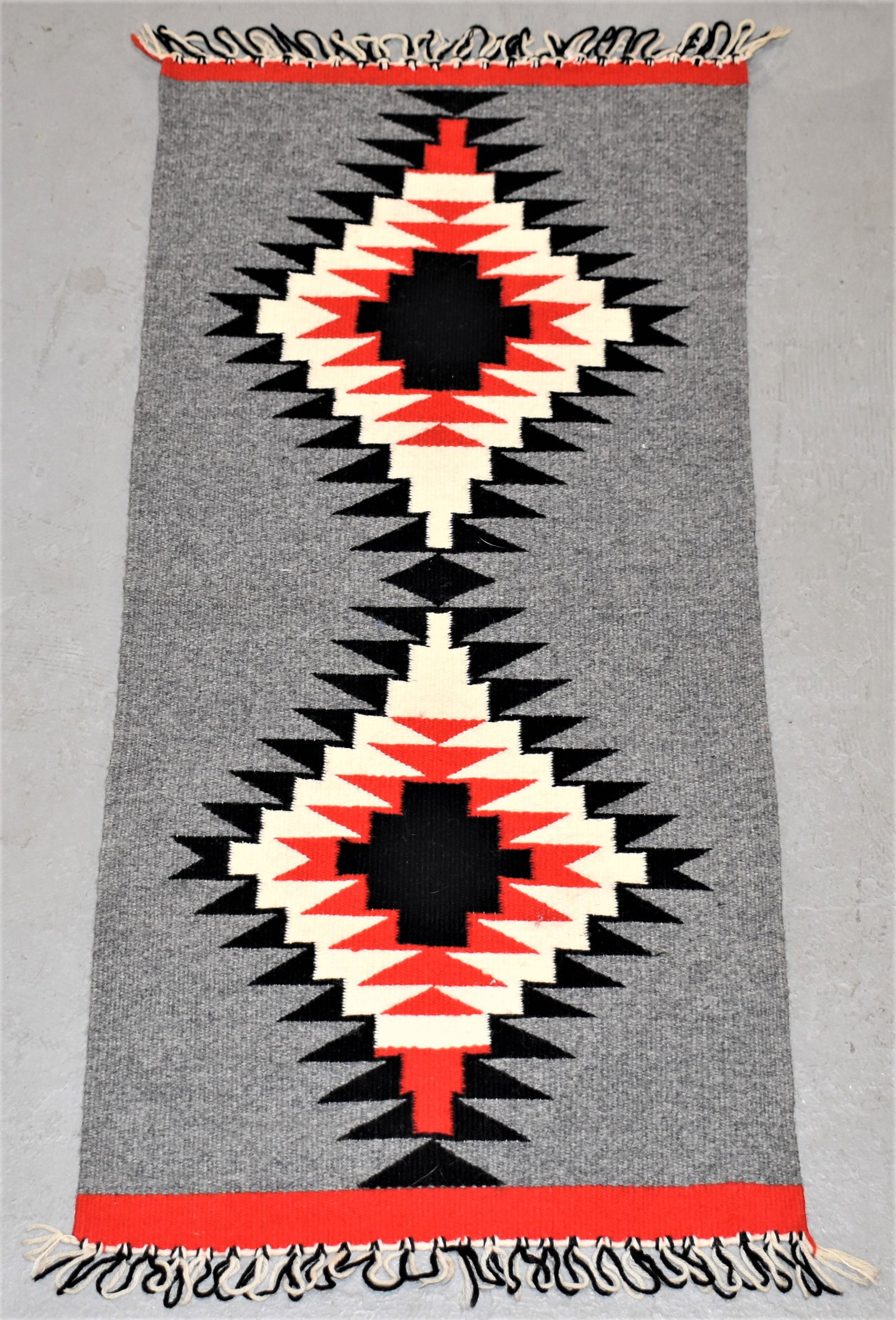 Small Navajo Weaving: MID 20TH CENTURY NATIVE AMERICAN STORM CLOUD PATTERN FLAT WEAVE - SMALL (RUG OR HANGING) - 38"L X 17 1/2"W - WEAR AND IMPERFECTIONS