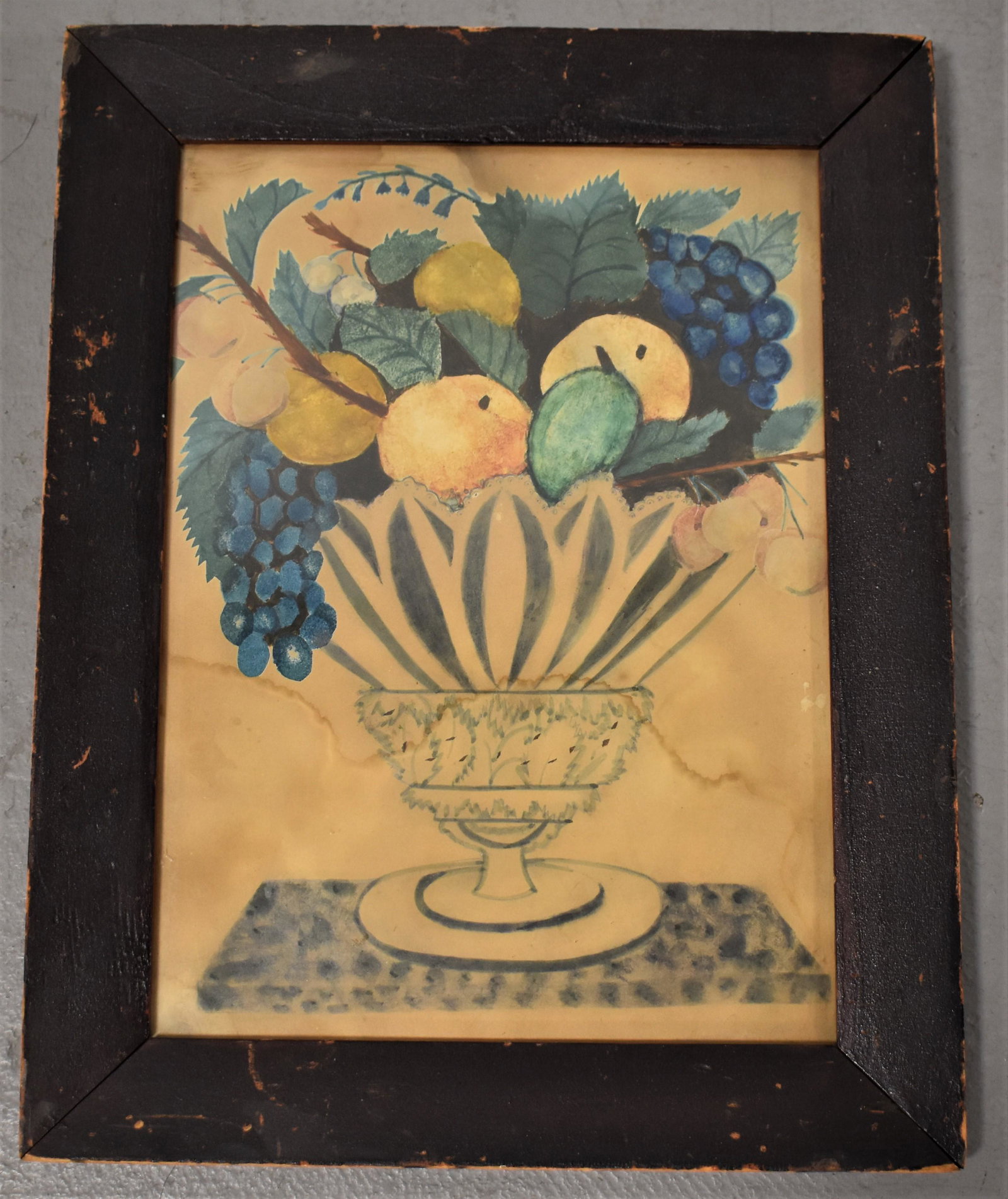 19th Century Theorem Painting on Paper: EARLY 19TH CENTURY THEOREM PAINTING ON PAPER OF A COMPOTE OF FRUIT IN PERIOD PAINT PINE FRAME - 11" X 8" SIGHT - WATER STAIN, TONING AND IMPERFECTIONS