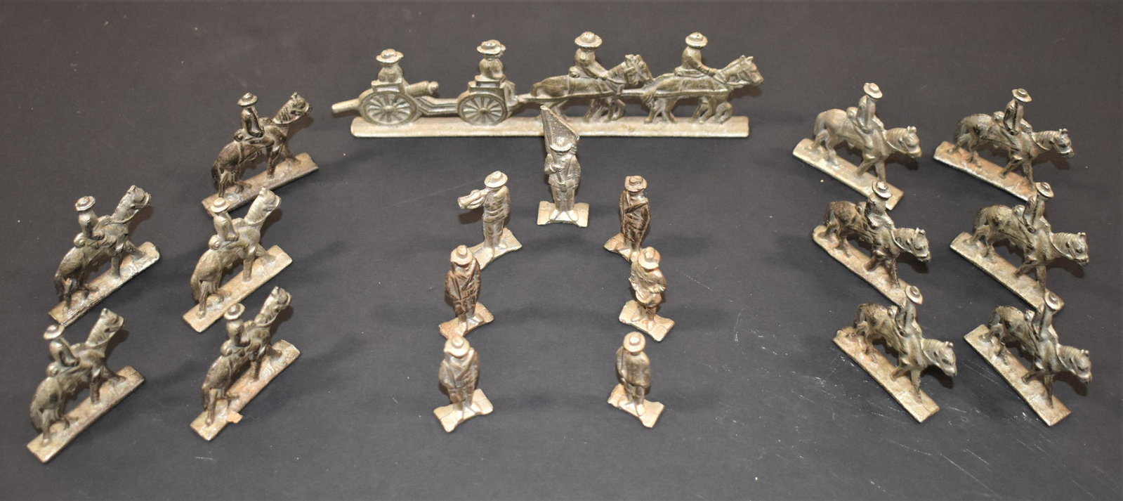 Lot of Military Lead Soldiers: LOT (19) UNDECORATED, LEAD SOLDIERS - (11) ON HORSEBACK (1) LONG DF HORSES PULLING CANNON (7) STANDING - IMPERFECTIONS