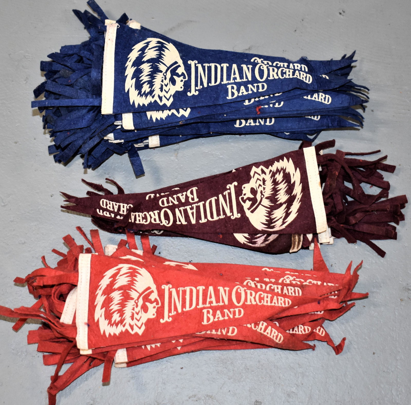 Lot of (75) Small Felt Pennants: (75) 10 1/2" VINTAGE FELT PENNANTS - INDIAN ORCHARD BAND - INDIAN ORCHARD MA. - WEAR, LOSSES AND IMPERFECTIONS