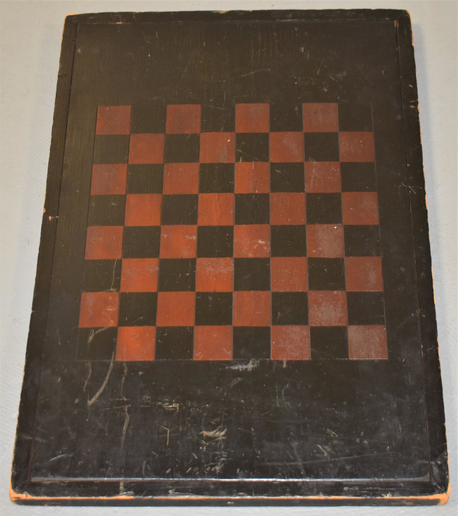 Early 20th Century Painted Wooden Game Board: EARLY 20TH CENTURY PAINTED PINE SINGLE SIDED WOODEN GAME BOARD WITH RED AND BLACK CHECKERBOARD - 19" x 13" - WEAR, IMPERFECTIONS