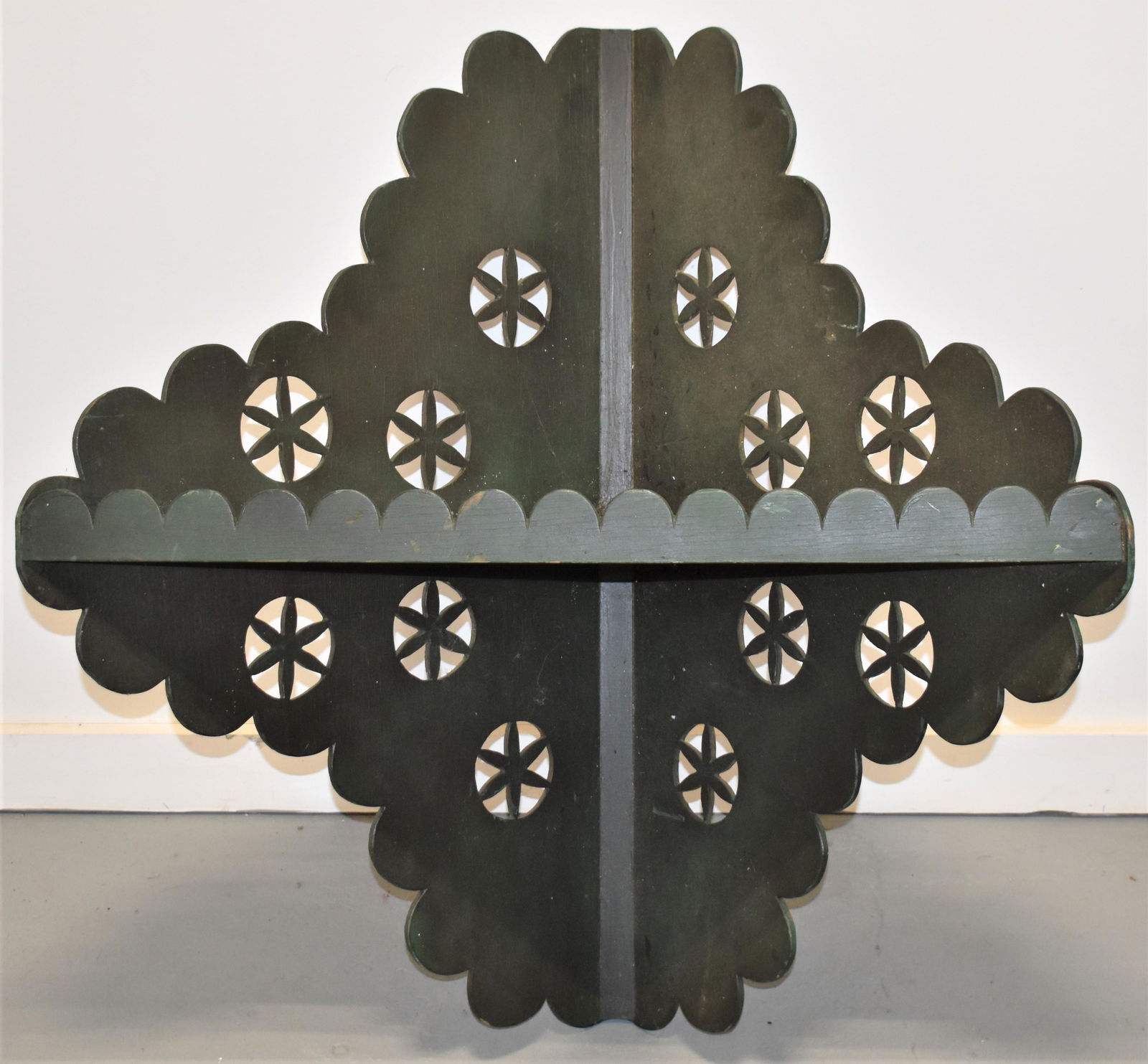 20th Century Folky Hanging Corner Shelf: 20TH CENTURY PAINTED WOODEN HANGING CORNER SHELF WITH CUT OUT SNOW FLAKE DECORATION IN DARK GREEN PAINT - 33 1/2"T x 31 1/2"W x 16 1/2"D - WEAR, IMPERFECTIONS