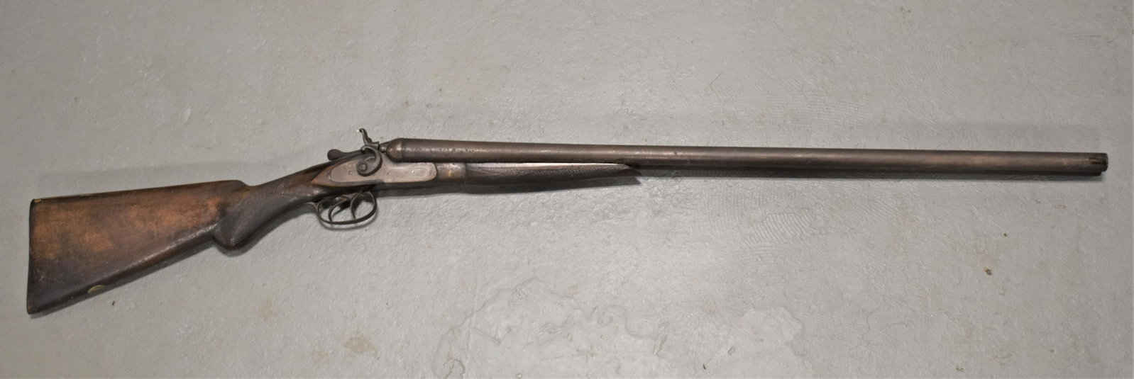 19th Century Belgian Double Barrel Shot Gun: 19TH CENTURY 12 GAUGE SIDE BY SIDE DOUBLE BARREL SHOT GUN MARKED P. CLAUSEN ON LEFT LOCK PLATE - TWIST BELGIUM ON BARREL RIB - WALNUT STOCK 47" TOTAL LENGTH - 31" BARREL OXIDATION - WEAR, IMPERFECTION