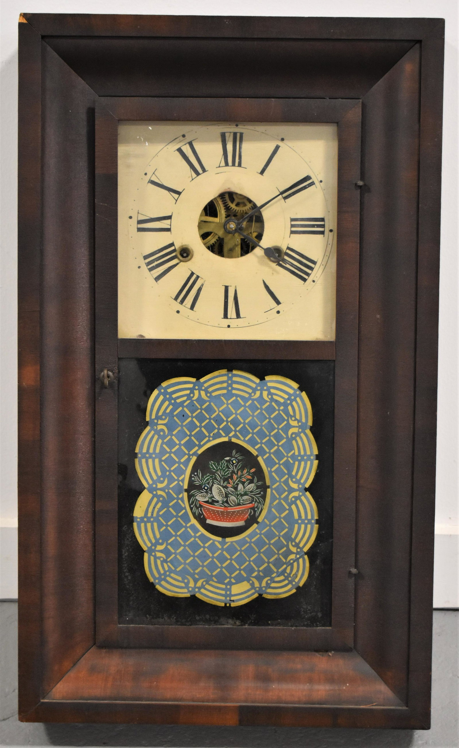 George Marsh Ogee Clock: 19TH CENTURY MAHOGANY CARVED OGEE SHELF CLOCK WITH PAINTED WOODEN DIAL, REVERSE PAINTED LOWER GLASS TABLET WITH BASKET OF FLOWERS - GEORGE MARSH LABEL INSIDE - WINCHESTER CONNECTICUT 25"T X 13 1/2"W -
