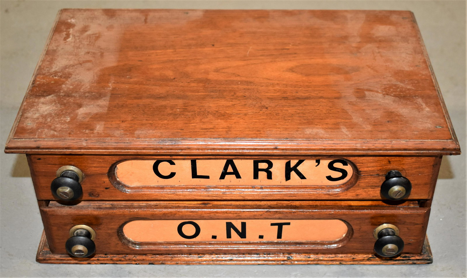 Victorian Metal 2 Drawer Spool Cabinet: 19th CENTURY VICTORIAN WALNUT 2 DRAWER SPOOL CABINET W/ EBONIZED PULLS, DRAWERS W/ CUT OUT LETTER CLARKS O. N. T. - 13'L X 7 3/4"W X 5"T - WEAR AND IMPERFECTIONS