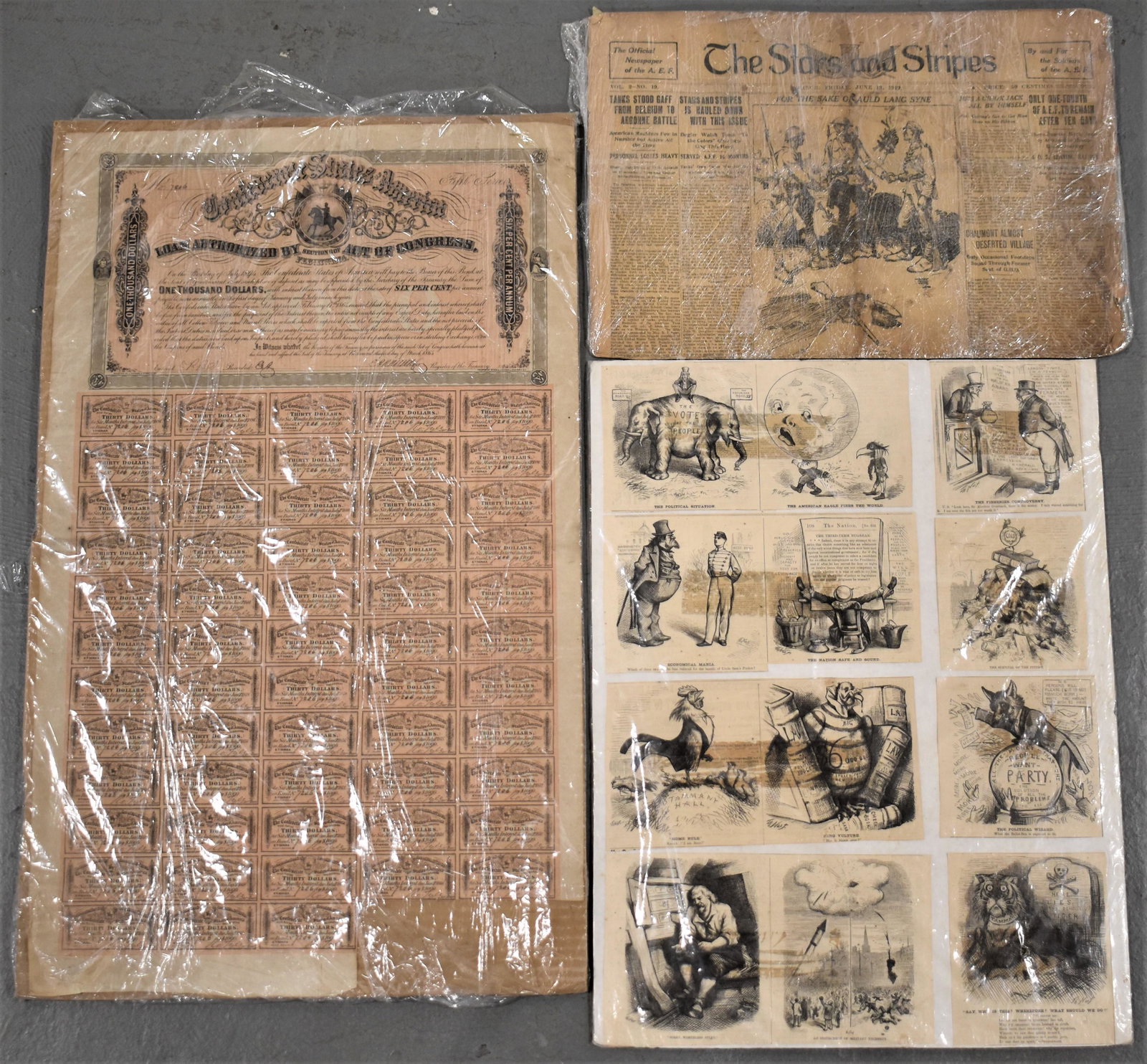 Lot of Miscellaneous Ephemera: LOT OF MISCELLANEOUS EPHEMERA TO INCLUDE STARS AND STRIPES NEWSPAPER JUNE 13TH, 1919 - CLIPPINGS OF POLITICAL AND MILITARY SATIRE AND CONFEDERATE STATES OF AMERICA BOND SHEET - ONE THOUSAND DOLLARS IN
