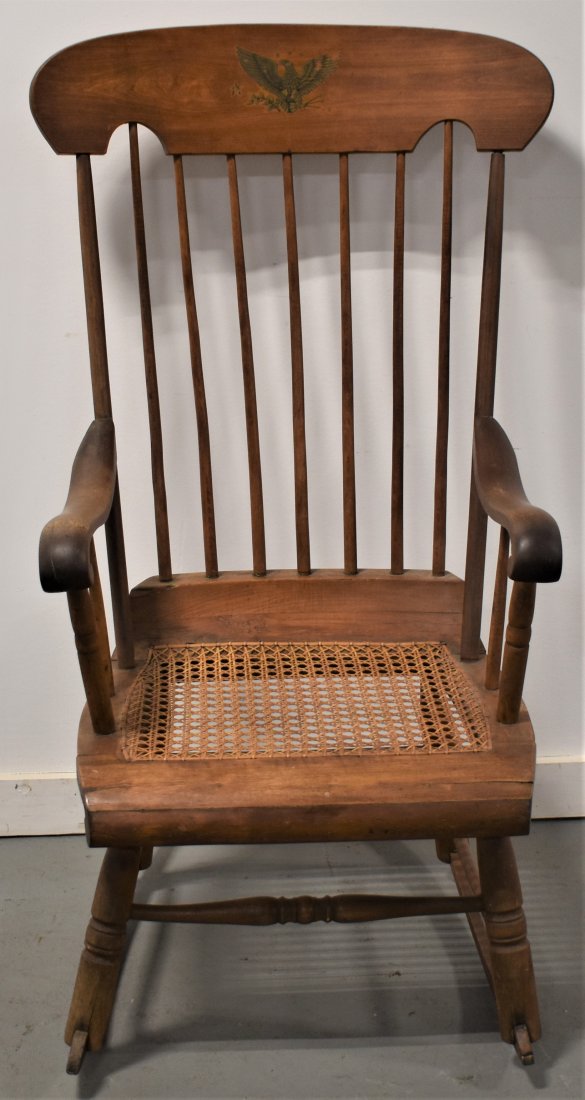 N.E. Boston Rocker W/ Rush Seat: 19TH CENTURY N.E. MAPLE BOSTON ROCKER W/ EAGLE DECAL IN NATURAL FINISH 41 12" - SEAT 15 1/2" - SPLITS, SMALL REPAIRS AND IMPERFECTIONS