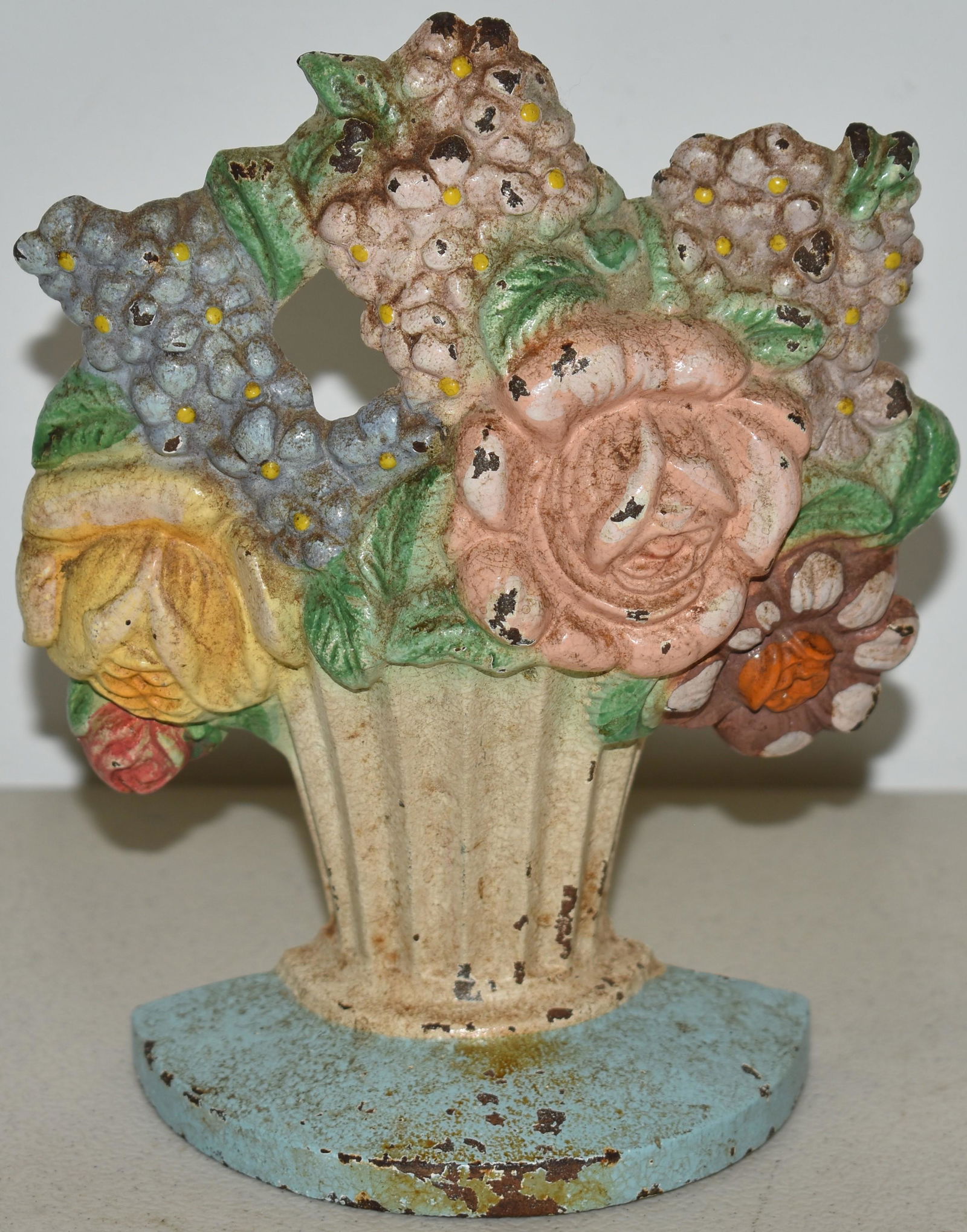 PAINTED CAST IRON VASE W/ FLOWER DOORSTOP (1 of 2)