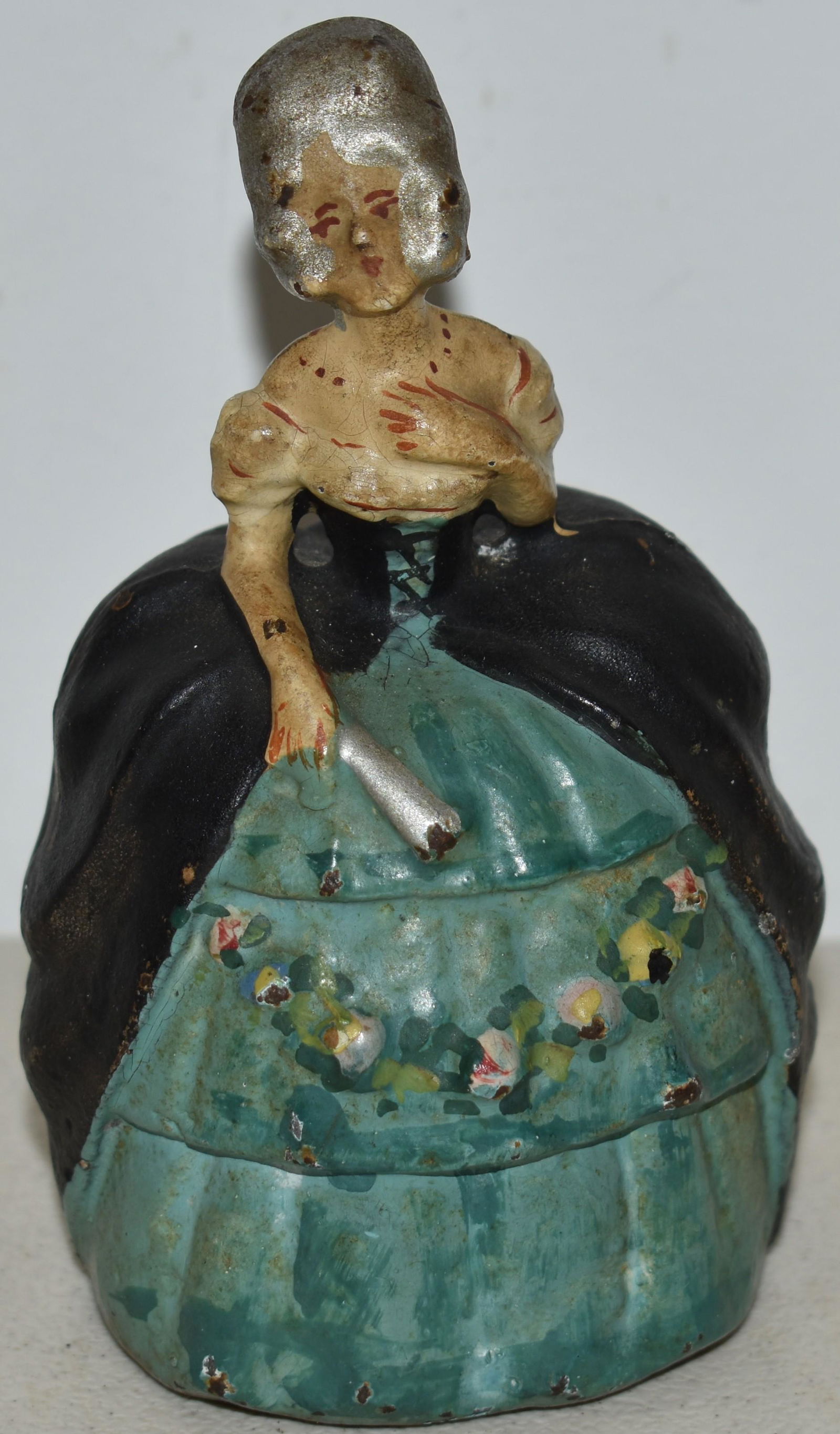 PAINTED CAST IRON COLONIAL LADY DOORSTOP (1 of 2)