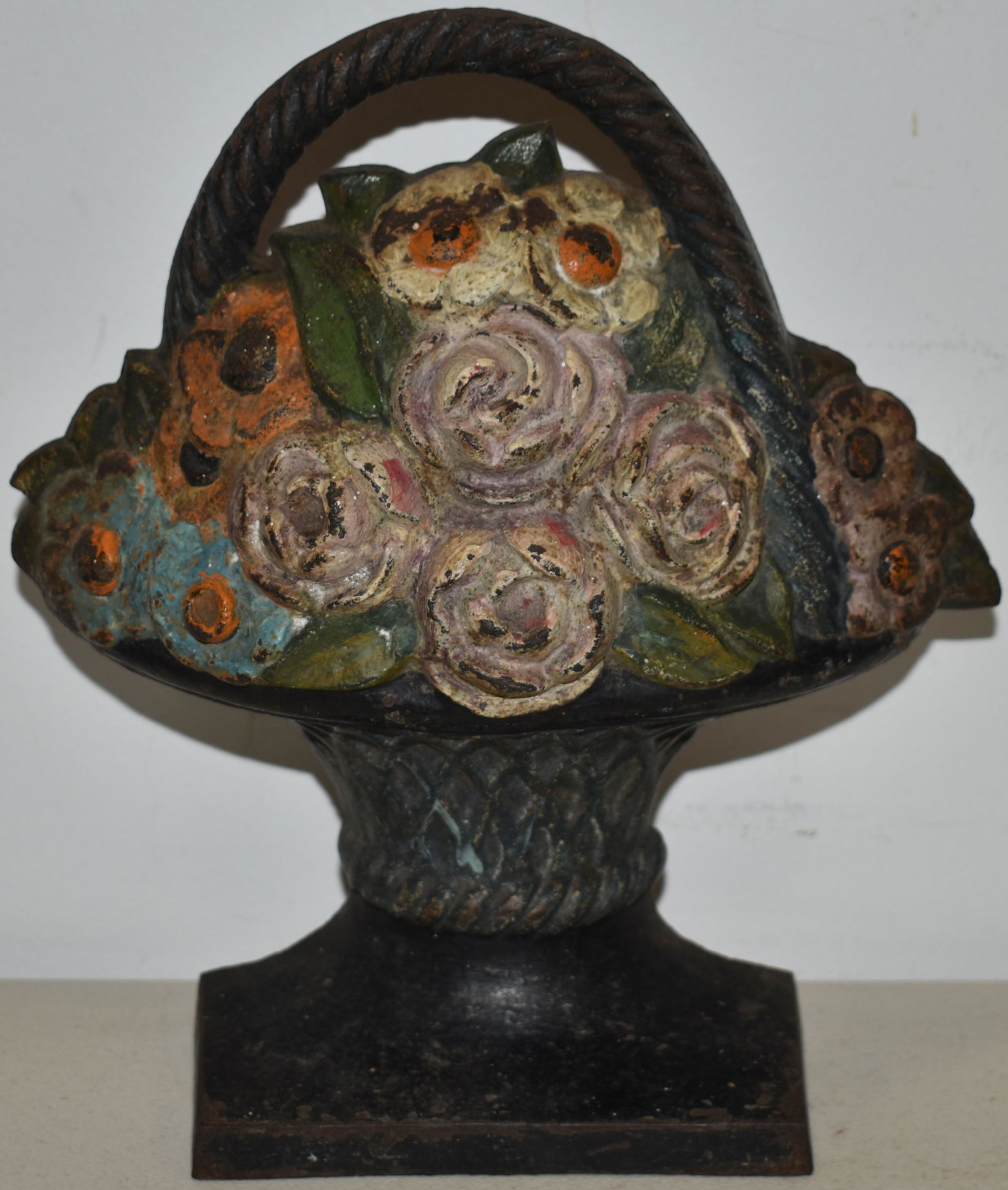 PAINTED CAST IRON BASKET OF FLOWERS DOORSTOP: 10" PAINTED CAST IRON BASKET OF FLOWERS DOORSTOP - WEAR & LOSSES PAINT, OXIDATION