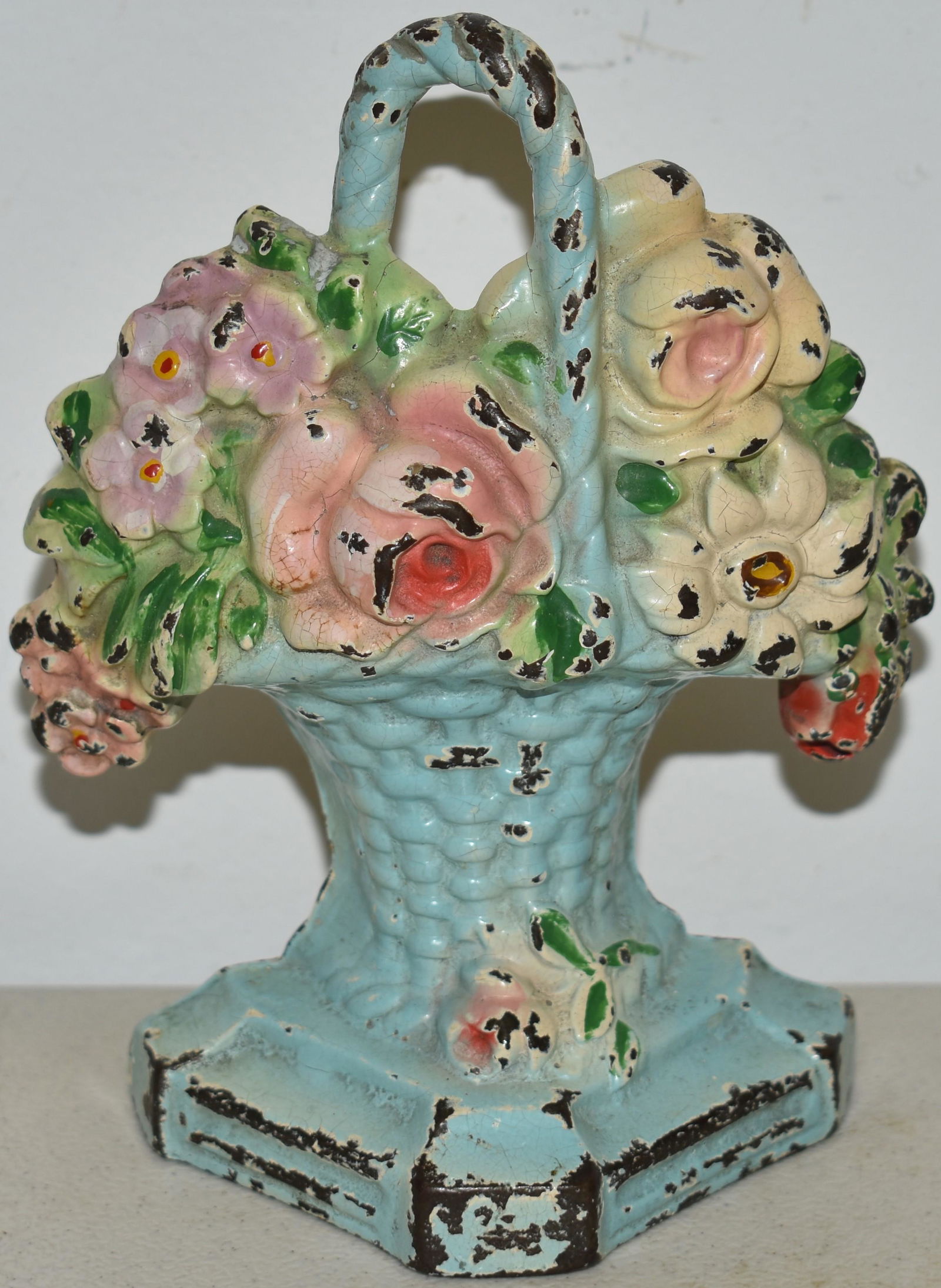PAINTED CAST IRON BASKET OF FLOWERS DOORSTOP (1 of 2)