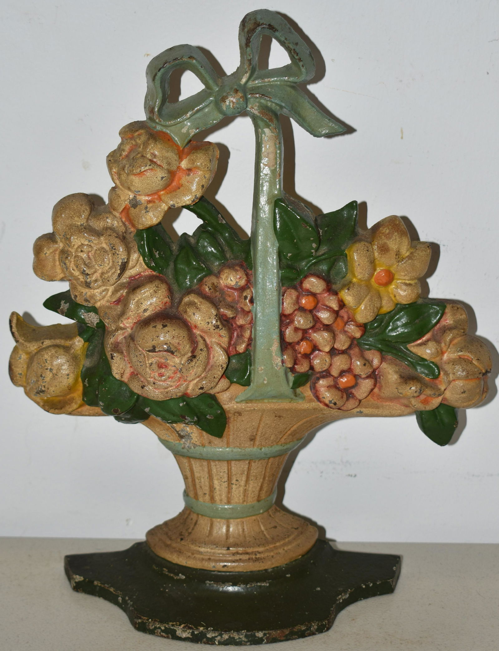 PAINTED CAST IRON BASKET OF FLOWERS DOORSTOP (1 of 2)