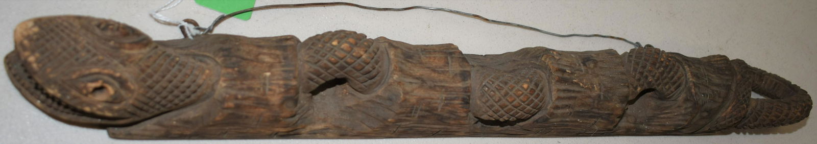 VITNAGE CARVED FOLK ART SNAKE: EARLY 20TH CENT CARVED WOODEN FOLK ART SNAKE IN LOG - SIGNED ON BOTTOM - CARVED BY DAVID. B. BLAIR - 1926 - 18 1/4" L IN NATURAL FINISH - EYELETTES FOR HANGING - WEAR & IMPERFECTIONS