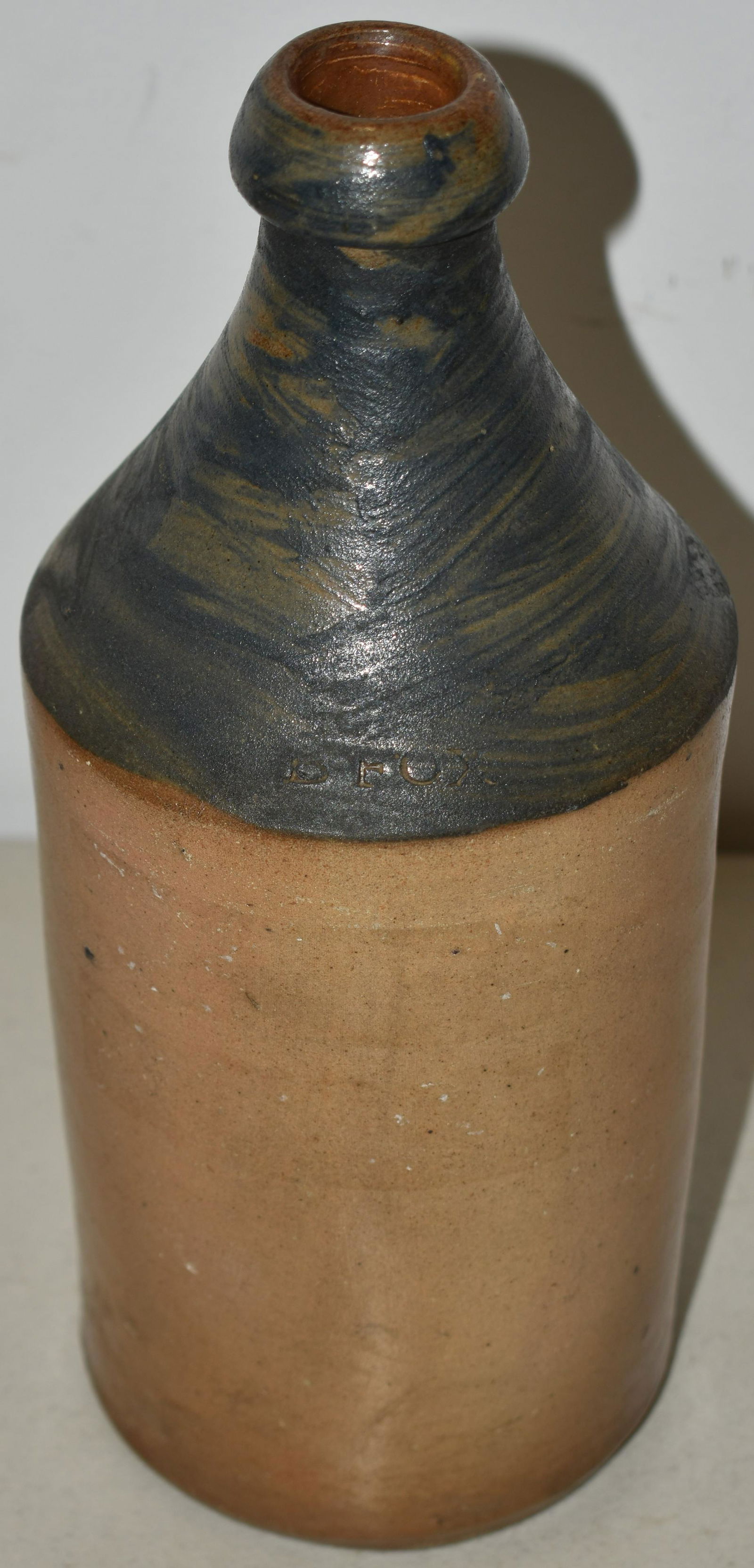 B. FOX  2  TONE STONEWARE BEER BOTTLE (1 of 3)