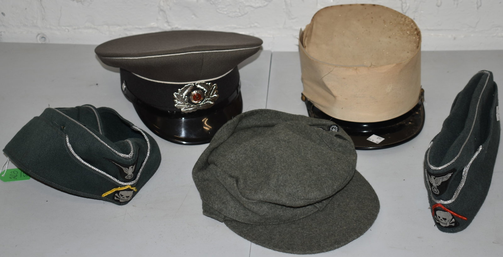 LOT WWII GERMAN MILTARY HATS & CAPS: (2) HATS ( 1 OFFICER, I WOOL) & (1) WHITE LEGION HAT TOGETHER W/ 2 AIRBORN CAPS (WOOL) IMPERFECTIONS