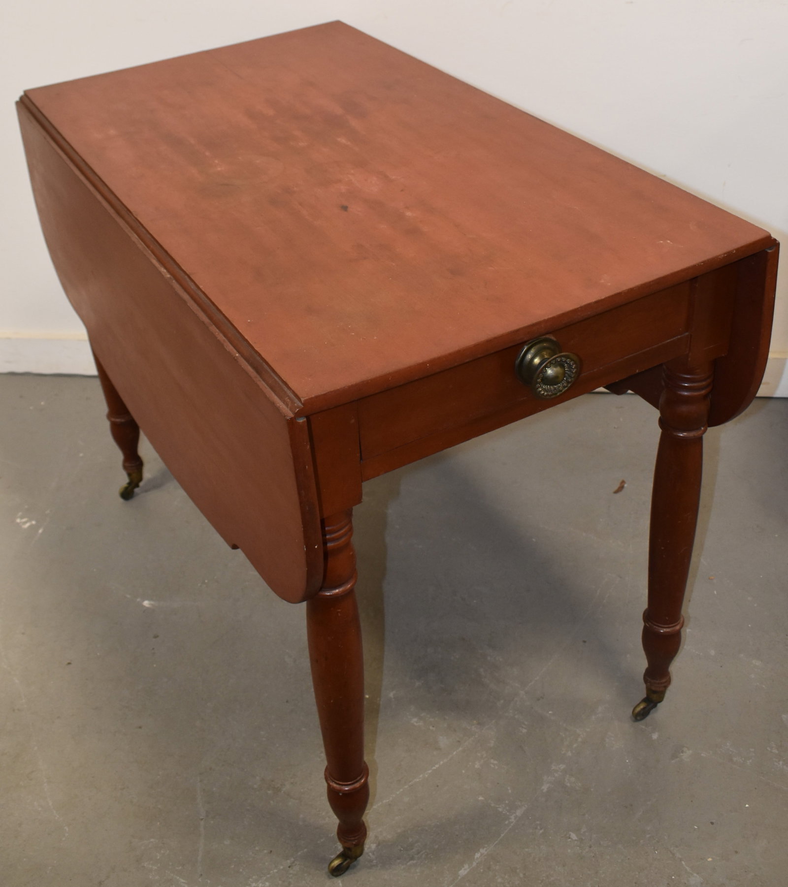 N.E. COUNTRY PAINTED SHERATON DROPLEAF TABLE: 19TH CENT SHERATON DROPLEAF TABLE W/ SHAPED LEAVES & SINGLE DRAWER IN OLD RED PAINT - 29" T X 38 3/4" L X 48" W - SM. SPLIT TOP - WEAR & IMPERFECTIONS