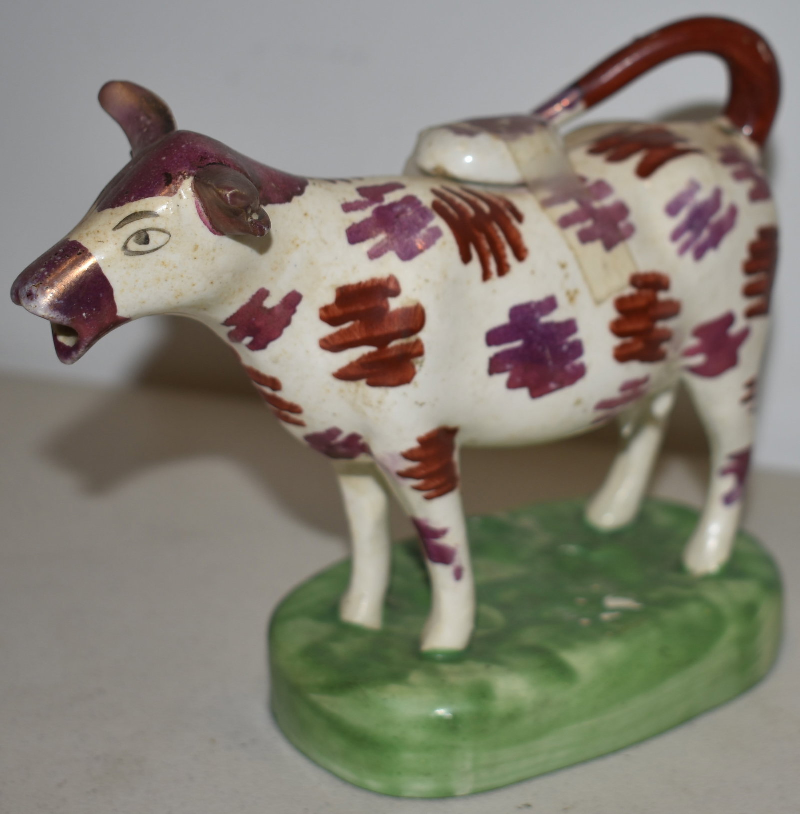 SUNDERLAND LUSTER COW CREAMER: EARLY 19TH CENT ENGLISH SUNDERLAND LUSTER COW CREAMER - 5 1/4" T X 7" L - WEAR & IMPERFECTIONS
