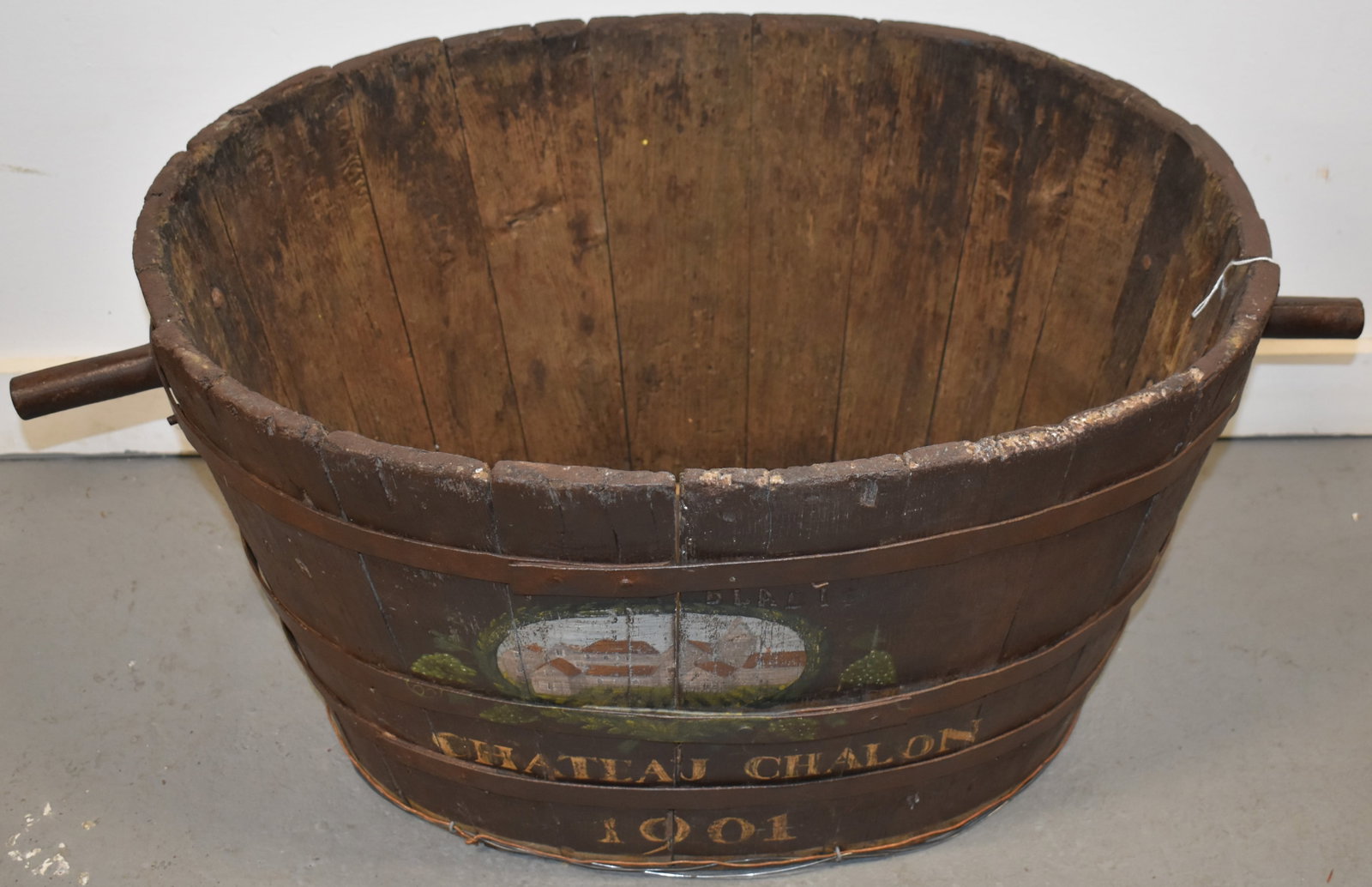 PAITNED WOODEN WASH TUB: EARLY 20TH CENT PAINTED WOODEN WASH TUB - CHATEAU CHALLON 1901 W/ VILLAGE SCENE - TUB BRANDED BLADIE - WOODEN SLATS W/ IRON BANDS & HANDLES - 16 1/2" T X 36" L W/ HANDLES X 22" W - WEAR, MISSING BOTTO