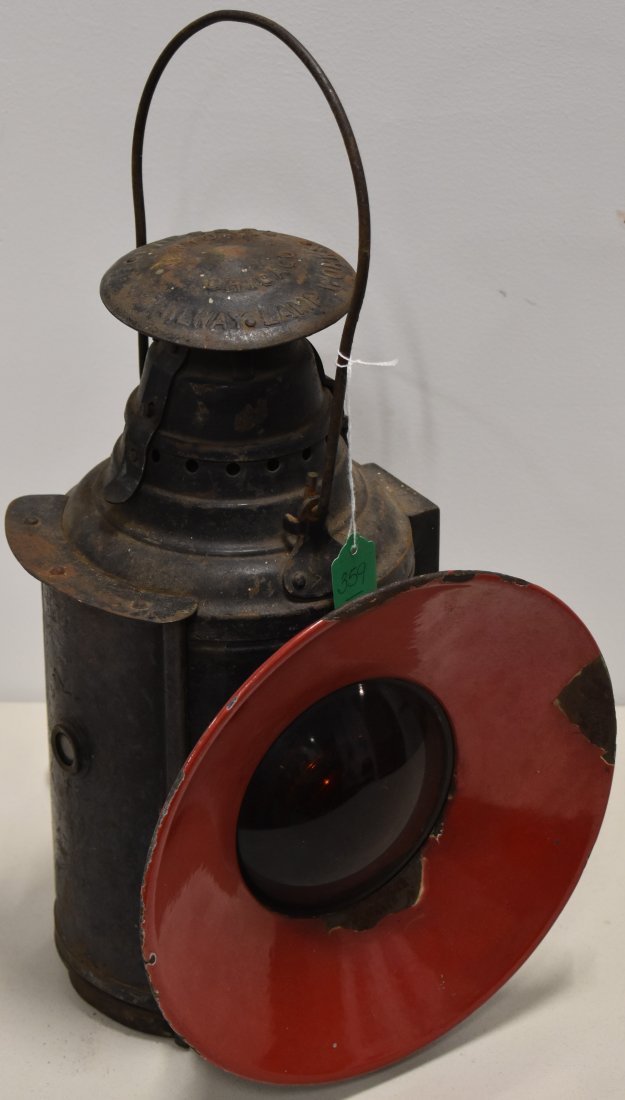 DRESSEL PAINTED PRESS STEEL RAILWAY LAMP: 18 1/2" BLACK PAINTED RAILWAY LAMP W/ RED ENAMEL REFLECTOR & RED LAMP LENSE - EMBOSSED THE DRESSEL RAIRL LAMP WORKS N.Y. - CHIC. - WEAR, OXIDATION, LOSSES TO REFLECTOR ENAMEL - ELECTRIFIED - IMPERFECT