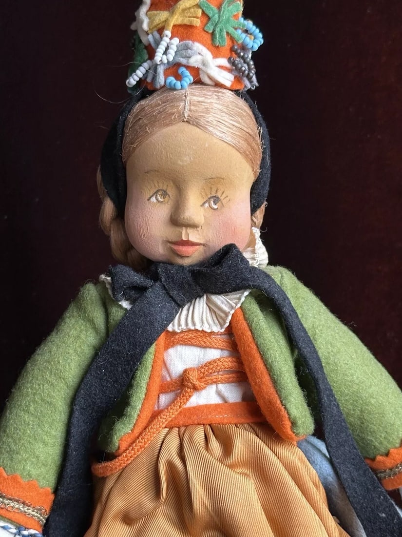 Antique German 9" Anna Fehrle Carved Wooden/Cloth Girl Doll with Tag: Beautiful all original doll! She has wooden head and cloth body. The doll is in good condition, with very light wear that can be seen on the photos. There is some discoloration to the face and the dre