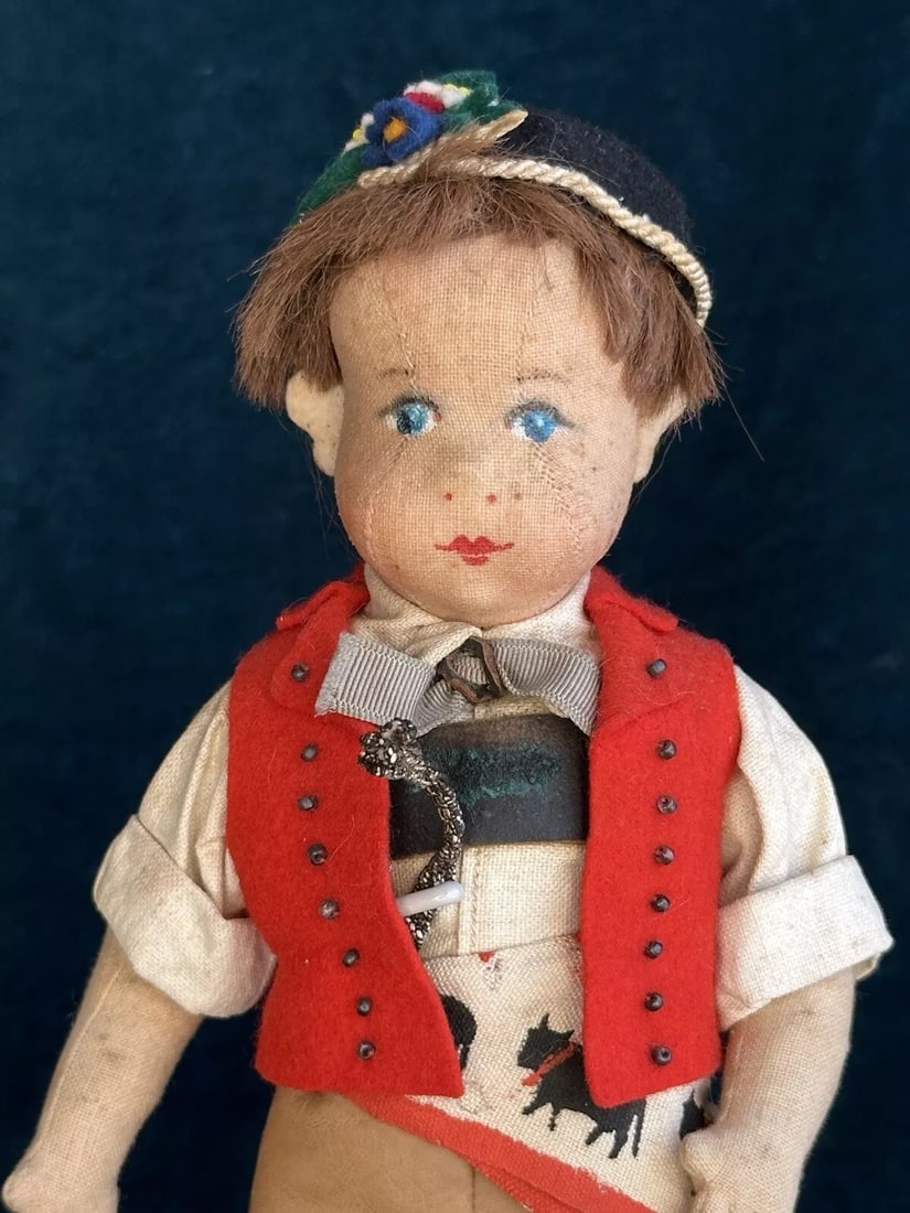 Unidentified Vintage 11" European Cloth Rag Boy Doll: The doll is well done. Looks like the boy is all original. The doll is tightly stuffed. Light wear to the doll that can be seen on the photos. It includes some stains to the face. No damage to the dol