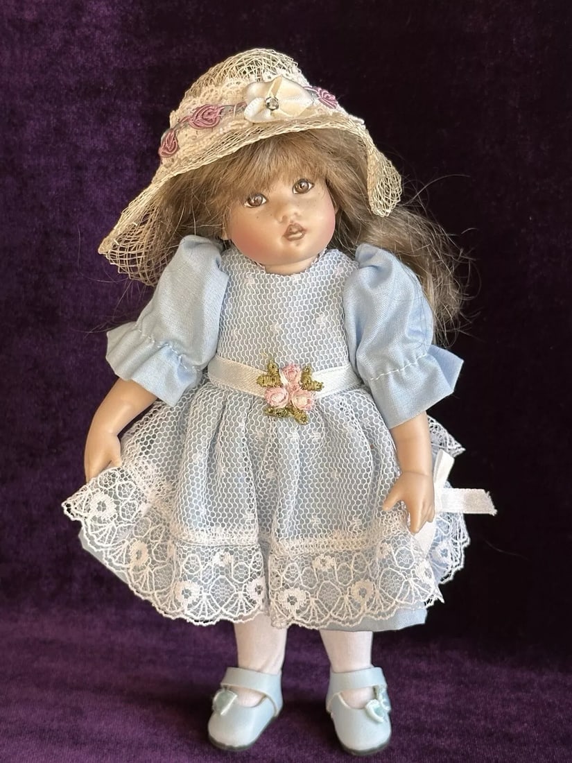 Vintage Artist Reproduction of JDK Kestner Hilda 8” Doll: Beautiful reproduction of antique doll. Looks reproduction of famous Hilda by JDK Kestner.She is about 8” tall.She has porcelain head and seeley type body. Signed on the back of her head with th