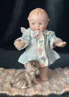 Artist Reproduction of Antique Scootles Cameo 4 1/2" All Porcelain Doll: She is about 4 1/2” tall; all porcelain. Movable extremities. Cute face painting. Marked on the back of her head- see photos. Decor is not included. Package dimensions: 6"-6"-6"