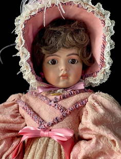 Vintage All Porcelain Reproduction of Antique French Bru Jne 25” Doll: Marked on the back of her head with the name of the artist who created her. She is about 25” tall; all porcelain. Stationary brown eyes. Beautifully and professionally done face painting.