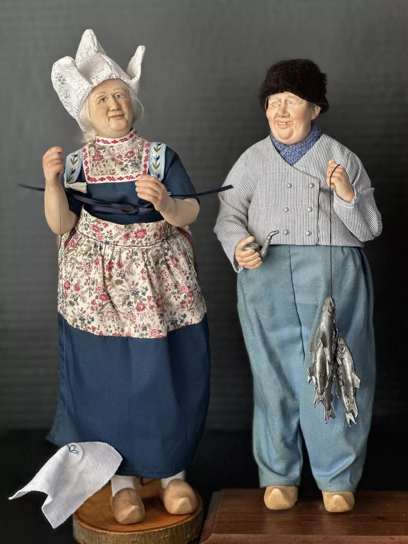 Lot Of 2 Vintage Polymer Artist Dolls By Randy And Diana Martindale: Beautiful collectible dolls by Randy and Diana Martindale. Female doll Anneke was created for UFDC. She is about 12” tall. Polymerhead and hands; cloth body and porcelain (?) partial legs. Fishe
