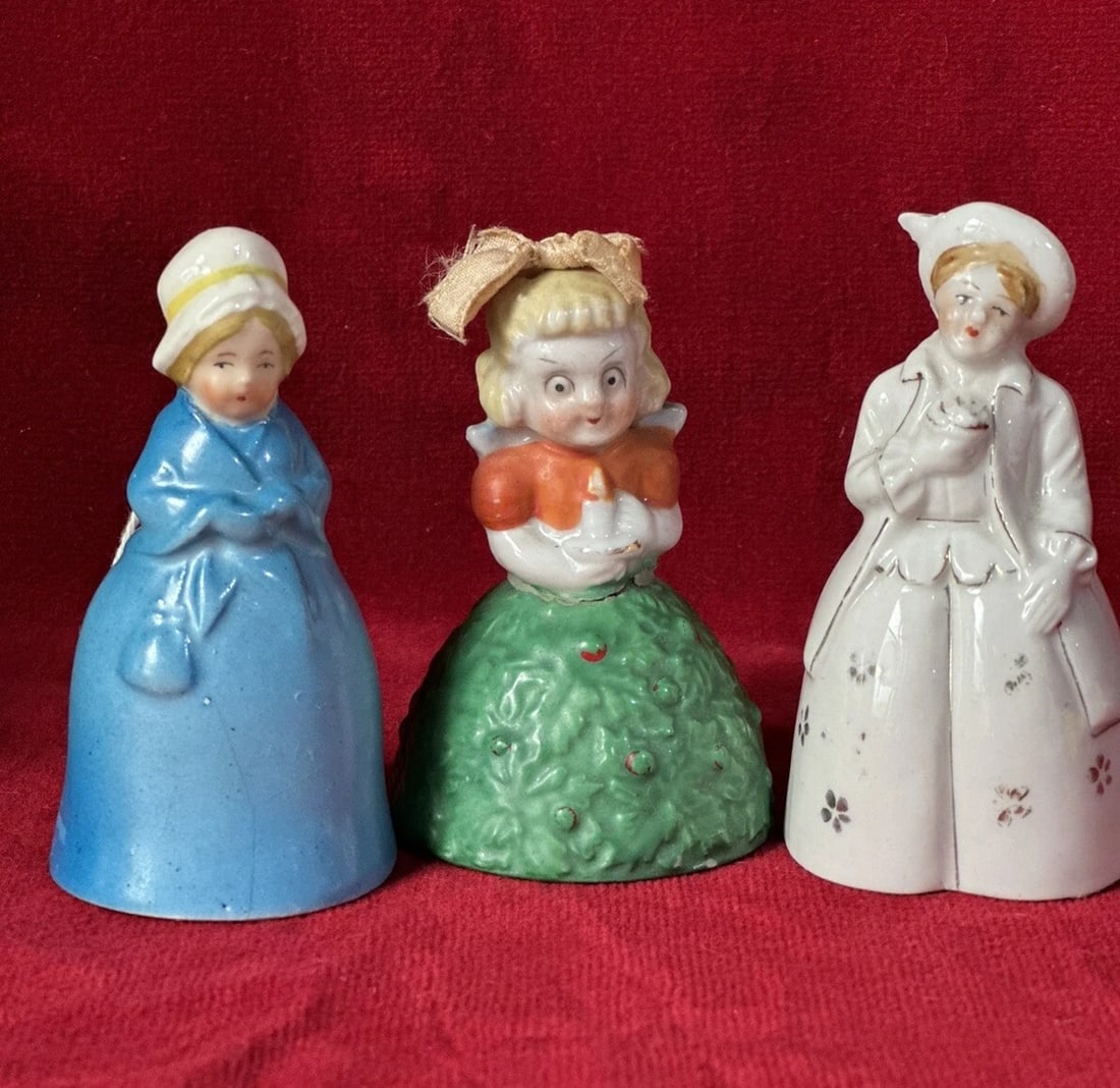 Lot Of 3 Porcelain Collectible Bells Figurines: Lot of 3 porcelain bells lady figurine dolls. Two out of three stamped Made in Japan. One of the bells has a hairline and another one broken and glued back - see all photos. Package dimensions: 9&rdqu