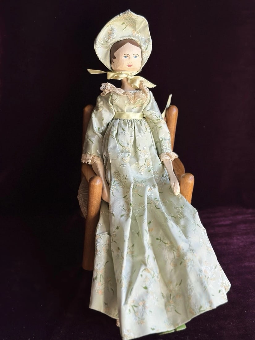 Hand-Carved 16.5" Peg-Jointed Grodnertal Style Wooden Reproduction Doll: Well made doll that is also beautifully styled. Unfortunately, we could not find any artist’s signature or date of creation. She resembles an antique German Grodnertal-style doll. The doll is peg jo