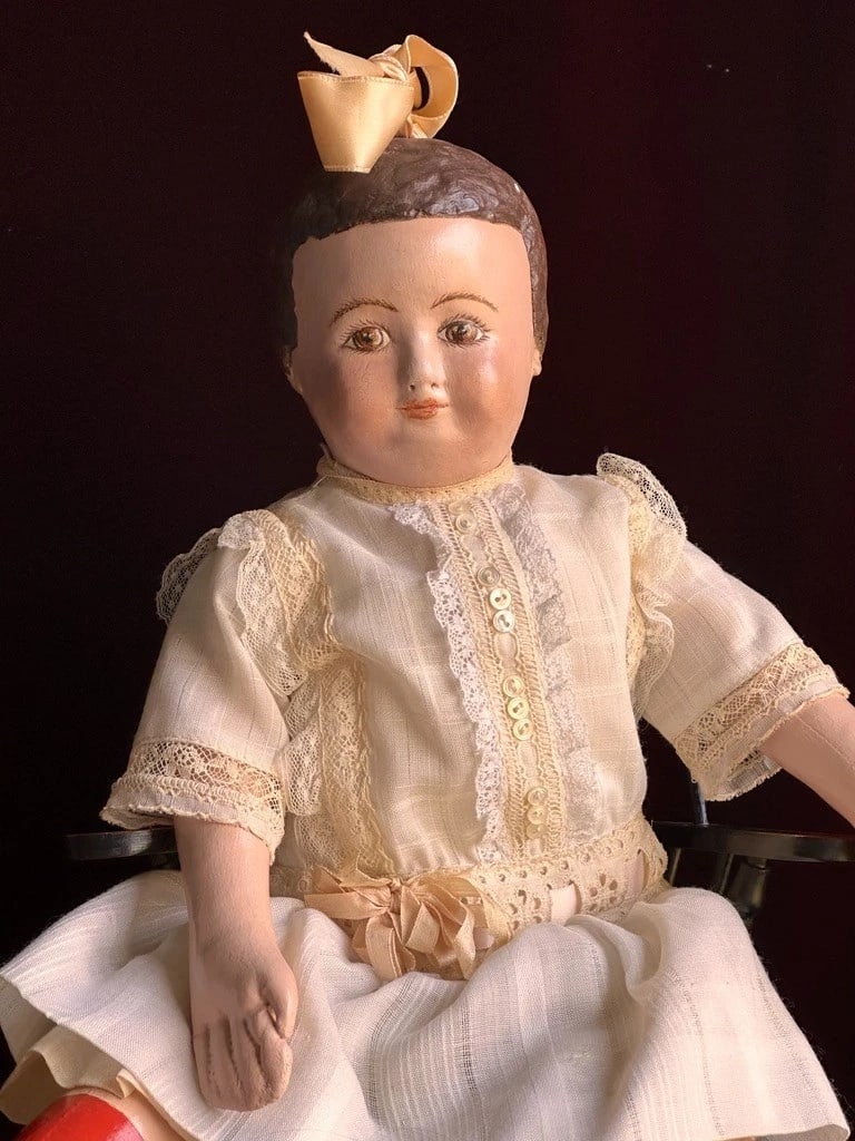 ODACA Artist 17" Reproduction of Alabama Baby Oil Painted Cloth Girl Doll: Here is a very beautifully made and rare reproduction of a famous antique doll. The doll is all original and comes dressed in beautifully made clothing. There is some paint wear to the head and the lo