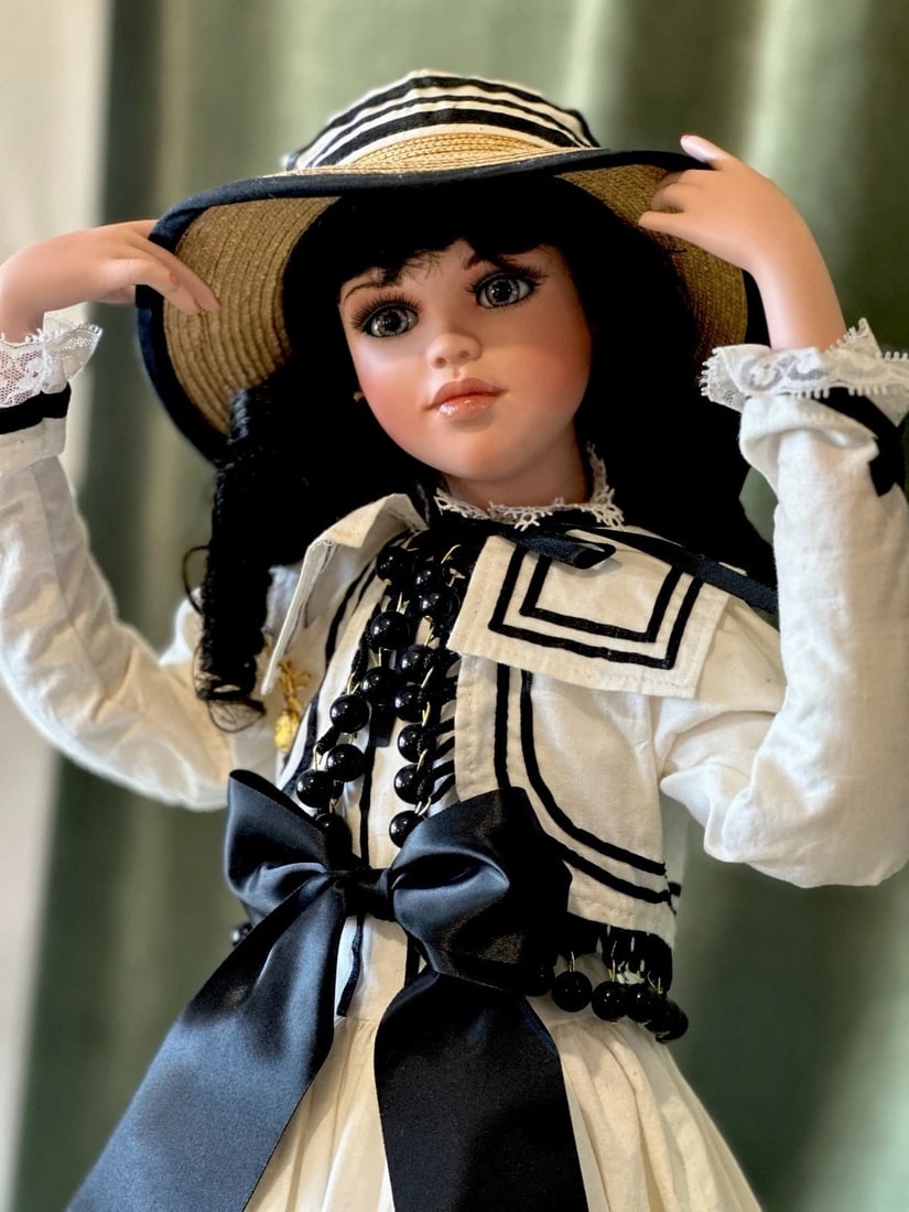 Jan Mclean 28" Porcelain Doll “Laura" Tag and COA For Exclusively Yours 1997: Beautiful doll by Jan Mclean!! Her name is Laura and she was created for Exclusively Yours collection. She is approximately 28” tall. She has porcelain head and partial extremities. The rest of