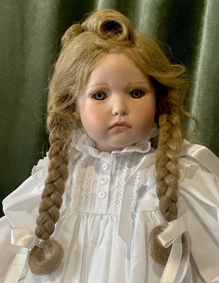 Collectible Porcelain 23” Doll Apple Annie by Julia Rueger LE 26/30: Beautiful Artist porcelain doll by Julia Rueger. She is a number 26 doll from a limited edition of 30 dolls worldwide!!!! Her name is Apple Annie. She is approximately 23” tall. Has to be displa