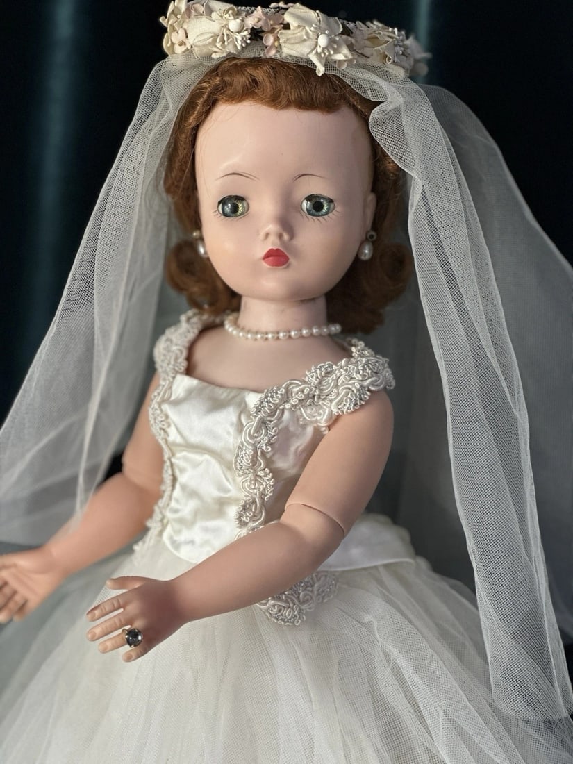 Collectible Julie Good Kruger 1993 Vinyl 20" Doll "Tess": Beautiful doll by Julia Good Krueger. Marked on the back of her head but it’s hard to read - see photo. She is all made of hard vinyl material. Body looks deformed at the waist; most likely from the