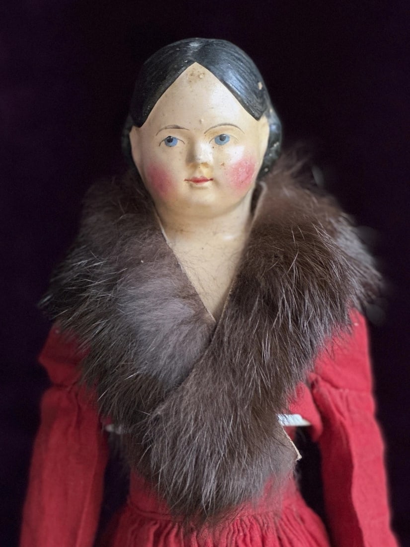 Large Antique German 15.5" Papier Mache Milliner's Model Covered Wagon Doll: This pretty doll is well preserved considering her age. There are some small paint flaws to the head, as well as a few light cracks to the shoulder plate. The leather body has no leaking, but there ar