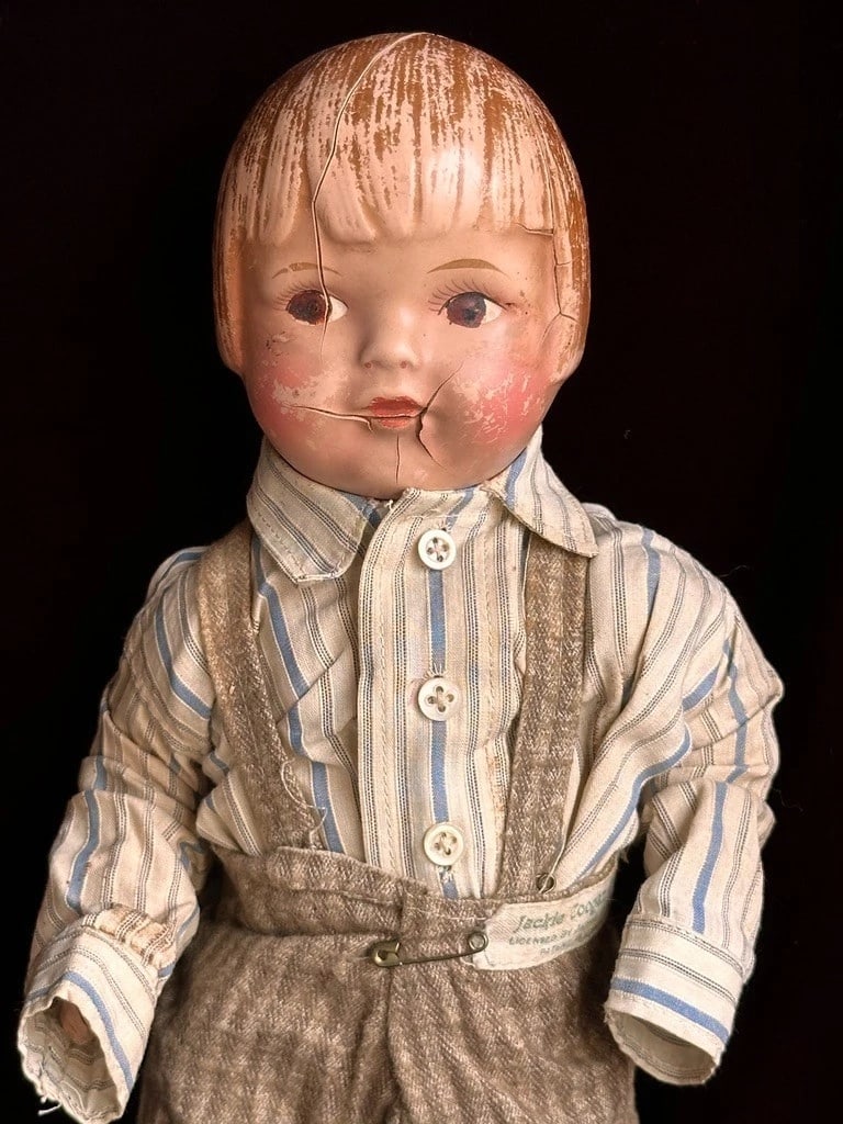 Rare Original Horsman 14" Composition Jackie Coogan Kid Celebrity Doll: Here is a very hard to find doll that is all original. Unfortunately, the doll is worn. It has cracks, as shown in the photos. This includes cracks to the head and lower arms. The rest of the doll is