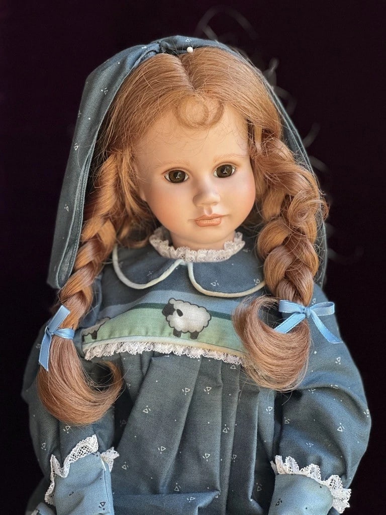 Collectible Porcelain 20" Linda Mason Originals Cristi Doll LE 50: This sweet doll by well-known artist Linda Mason has a porcelain shoulder plate, head, and porcelain lower limbs, with the rest of the body made of cloth. The doll can be displayed either seated or st
