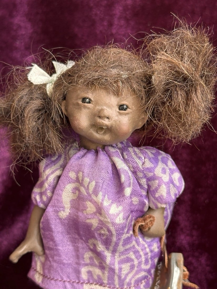 OOAK Miniature Handmade Elizabeth Cooper Polymer Clay Cloth African Girl Doll: Adorable little doll by well-known doll artist. She is in great pre-owned condition. No flaws were found. The doll is clean. Please refer to the pictures for more details. The stand is included.Packag