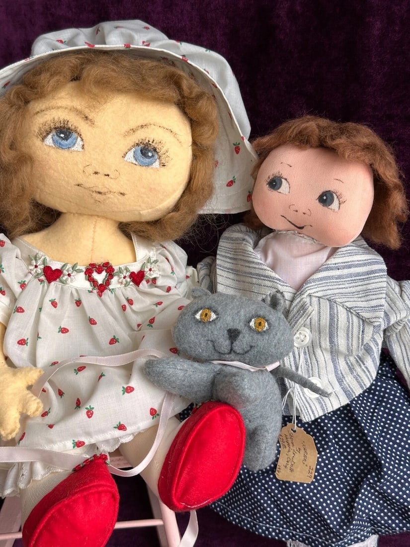 Lot of 2 Vintage Handmade Cloth Felt Dolls: Adorable dolls! They are 16" and 14" tall. One of them is coming with a little dog toy. Bothe dolls are in overall good condition and clean. Light wear to the dolls is possible since they are old and