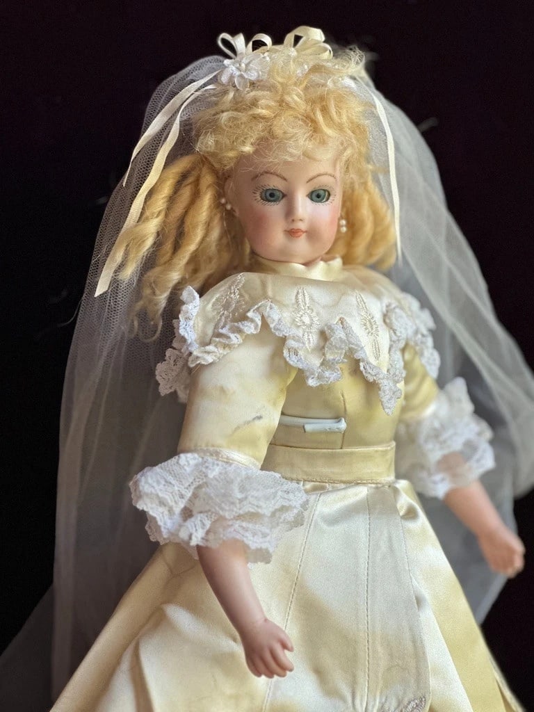 Vintage Porcelain 15" Reproduction of Antique French Gaultier Fashion Bride Doll: Very sweet old doll. She has no damage. There are some small paint flaws. The doll is in a good condition.The body of the doll is cloth, the head, shoulder plate and lower limbs are porcelain.The doll