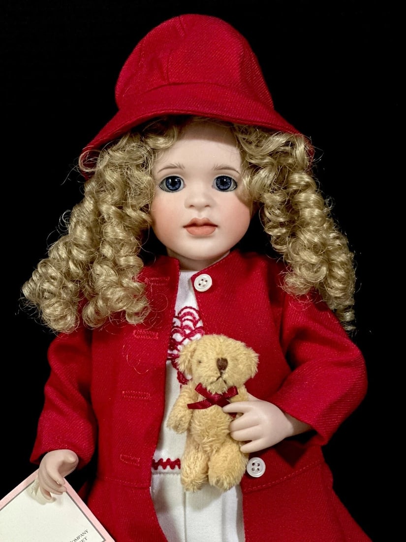 Wendy Lawton "Teddy And Me" 13" Porcelain Doll Box/Tag/COA Signed: Porcelain 13" doll by Wendy Lawton.She is all porcelain.Her name is "Teddy and Me."Comes with tag, COA and boxNo stand. Wear and tear is present to the box. Teddy bear is not original to this dollPack
