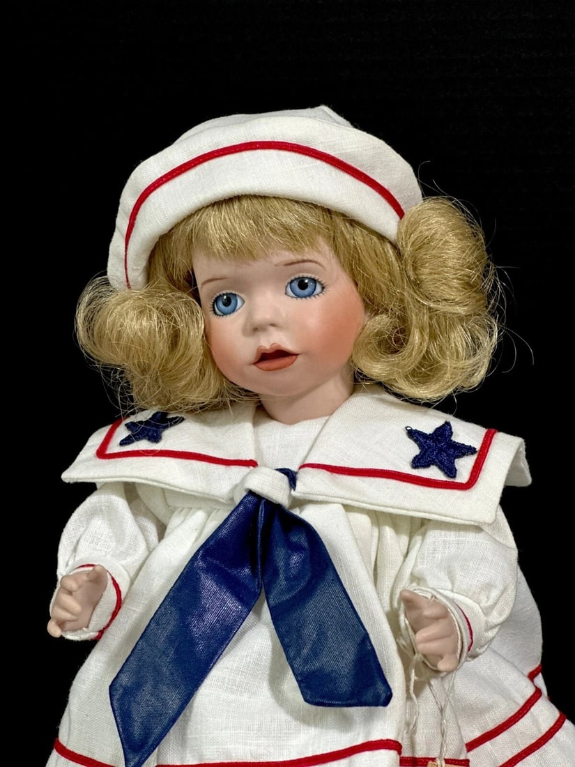 Wendy Lawton "Honey Bunch" 13" Porcelain Doll Box/Tag/COA Limited Edition 11/250: Porcelain 13" doll by Wendy Lawton.She is all porcelain.Her name is "Honey Bunch."Comes with tag, COA and boxComes with stand. Wear and tear is present to the box. Unsure if missing any accessoriesPac