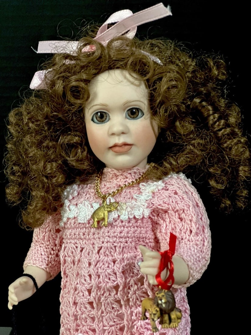 Wendy Lawton "African Safari Ground Tour" 11" Porcelain Doll LE 297/350: Porcelain 11" doll by Wendy Lawton.She is all porcelain.She is a part of "African Sarafi Ground Tour". She is missing all of her accessories including trunk with clothes, binoculars, leather bag, etc.